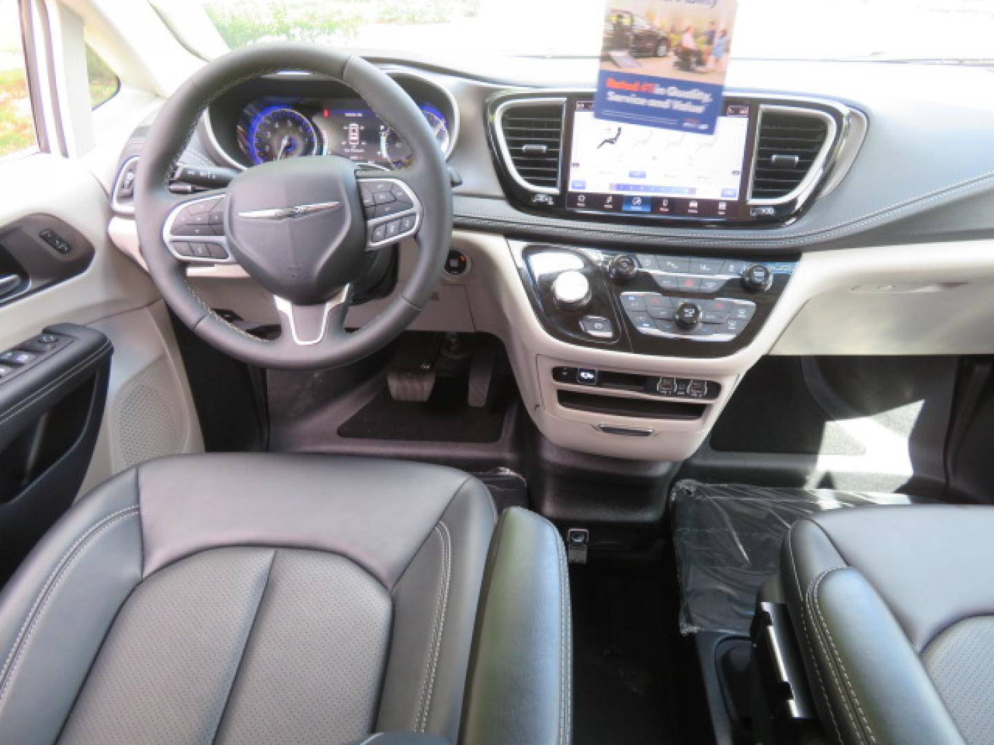 2024 White /Black Chrysler Pacifica Touring L (2C4RC1BG3RR) with an 3.6L V6 DOHC 24V engine, 9A transmission, located at 4301 Oak Circle #19, Boca Raton, FL, 33431, (954) 561-2499, 26.388472, -80.084045 - Certified Pre-Owned BraunAbility Chrysler Pacifica - Backed by a 7-Year/100K Mile Warranty! Experience the road with unmatched independence in this beautifully maintained, white Chrysler Pacifica minivan, professionally converted by BraunAbility. This vehicle isn't just pre-owned—it's Certified - Photo#46