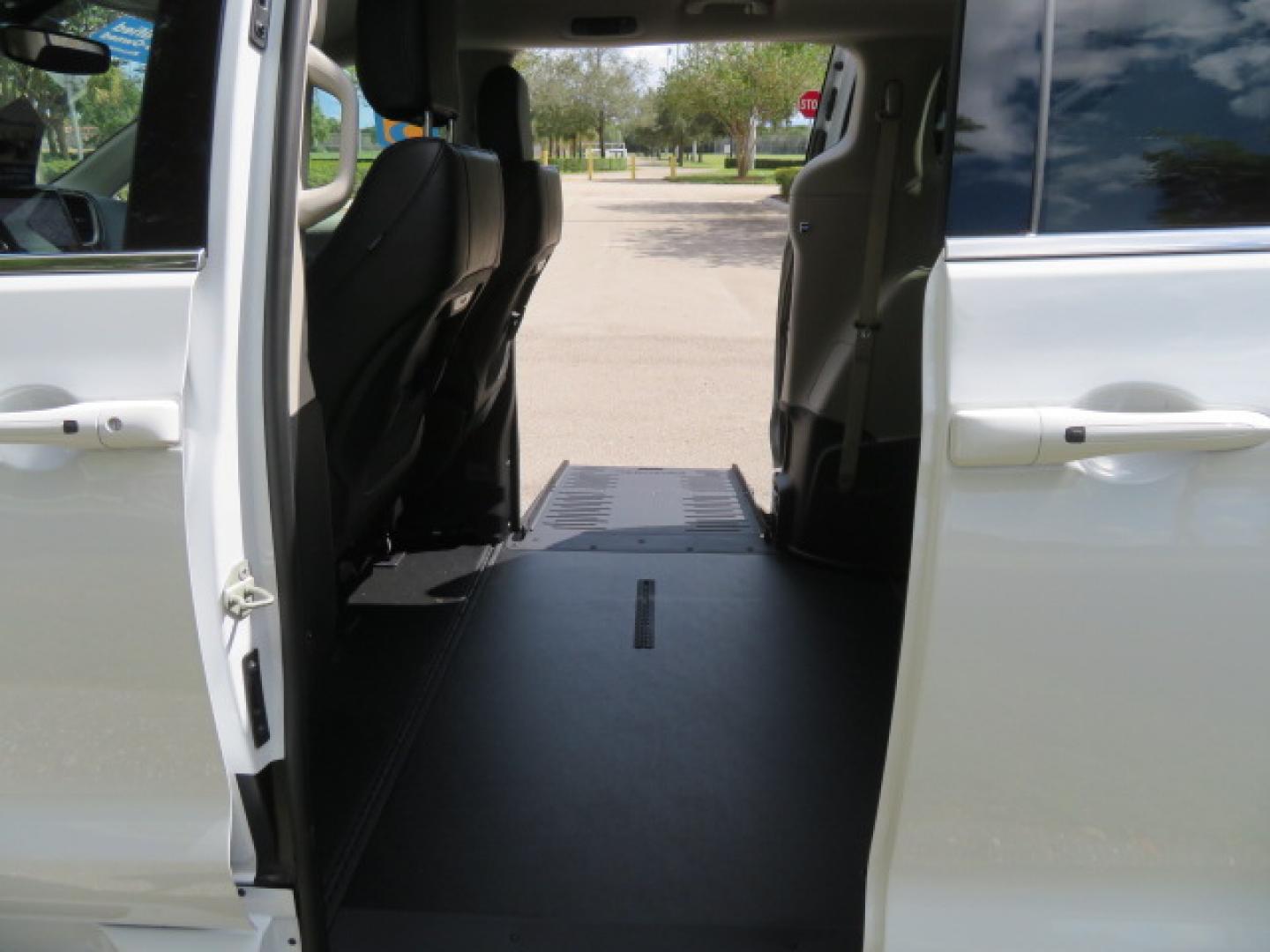 2024 White /Black Chrysler Pacifica Touring L (2C4RC1BG3RR) with an 3.6L V6 DOHC 24V engine, 9A transmission, located at 4301 Oak Circle #19, Boca Raton, FL, 33431, (954) 561-2499, 26.388472, -80.084045 - Certified Pre-Owned BraunAbility Chrysler Pacifica - Backed by a 7-Year/100K Mile Warranty! Experience the road with unmatched independence in this beautifully maintained, white Chrysler Pacifica minivan, professionally converted by BraunAbility. This vehicle isn't just pre-owned—it's Certified - Photo#57