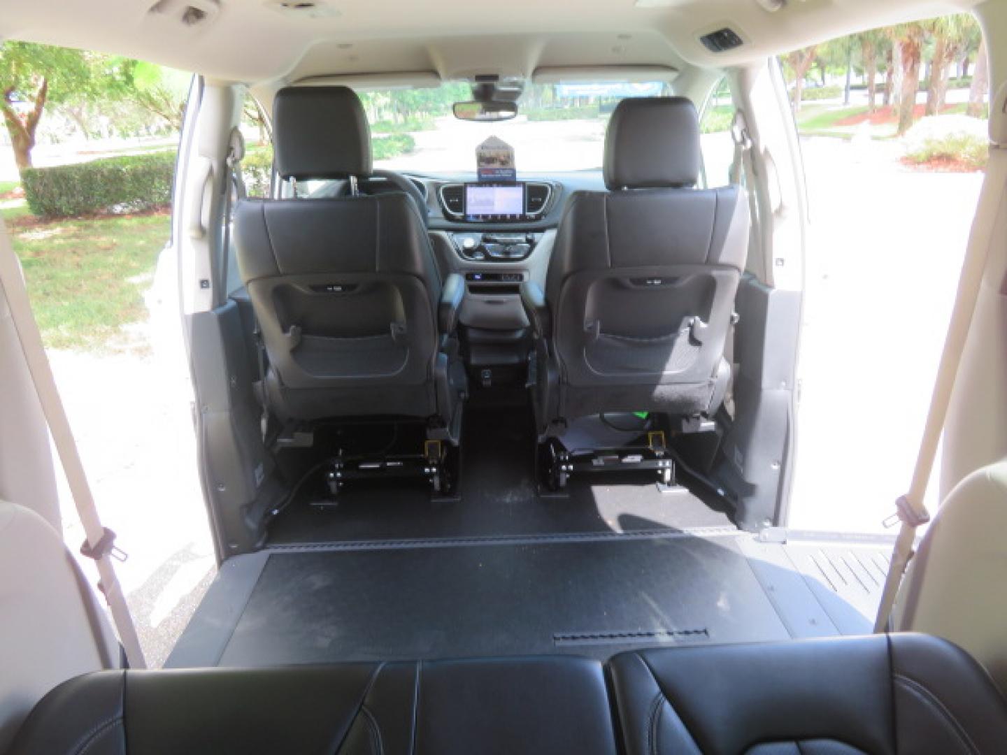 2024 White /Black Chrysler Pacifica Touring L (2C4RC1BG3RR) with an 3.6L V6 DOHC 24V engine, 9A transmission, located at 4301 Oak Circle #19, Boca Raton, FL, 33431, (954) 561-2499, 26.388472, -80.084045 - Certified Pre-Owned BraunAbility Chrysler Pacifica - Backed by a 7-Year/100K Mile Warranty! Experience the road with unmatched independence in this beautifully maintained, white Chrysler Pacifica minivan, professionally converted by BraunAbility. This vehicle isn't just pre-owned—it's Certified - Photo#61