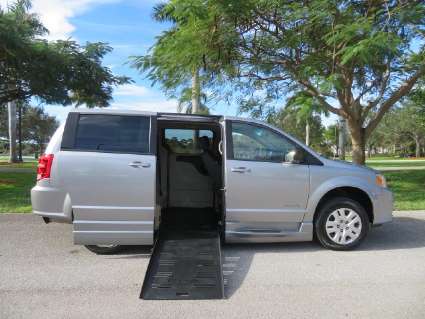 2018 Silver /Black Dodge Grand Caravan SE Plus (2C7WDGBG1JR) with an 3.6L V6 DOHC 24V engine, 6A transmission, located at 4301 Oak Circle #19, Boca Raton, FL, 33431, (954) 561-2499, 26.388472, -80.084045 - ? Supreme Motors and Mobility ? 2018 Dodge Grand Caravan SE – BraunAbility Entervan Conversion Upgrade your independence with this beautifully equipped 2018 Dodge Grand Caravan SE, featuring a BraunAbility Entervan Power Side-Entry Foldout Ramp Conversion. This van has been fully serviced, inc - Photo#40