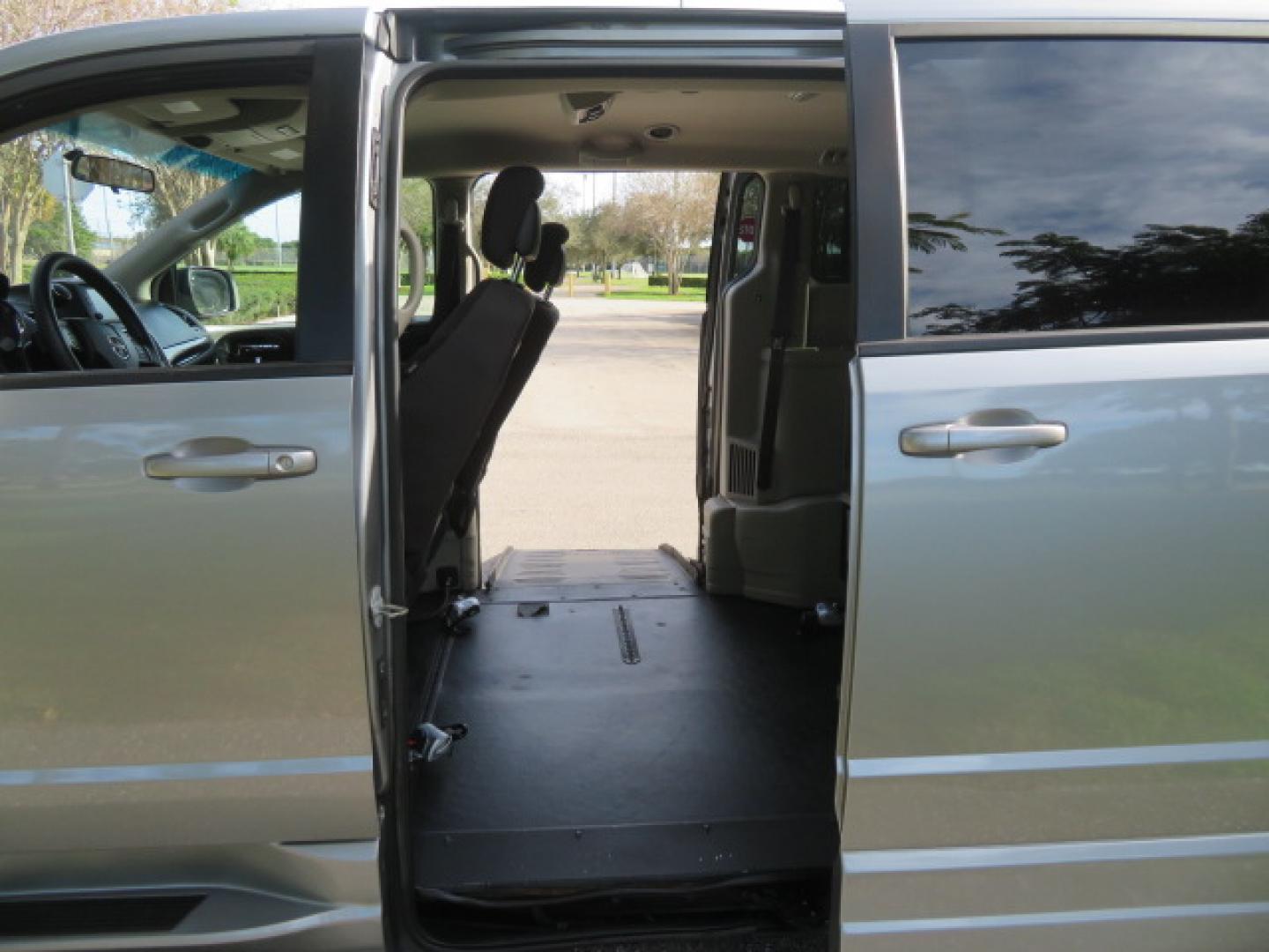 2018 Silver /Black Dodge Grand Caravan SE Plus (2C7WDGBG1JR) with an 3.6L V6 DOHC 24V engine, 6A transmission, located at 4301 Oak Circle #19, Boca Raton, FL, 33431, (954) 561-2499, 26.388472, -80.084045 - ? Supreme Motors and Mobility ? 2018 Dodge Grand Caravan SE – BraunAbility Entervan Conversion Upgrade your independence with this beautifully equipped 2018 Dodge Grand Caravan SE, featuring a BraunAbility Entervan Power Side-Entry Foldout Ramp Conversion. This van has been fully serviced, inc - Photo#59