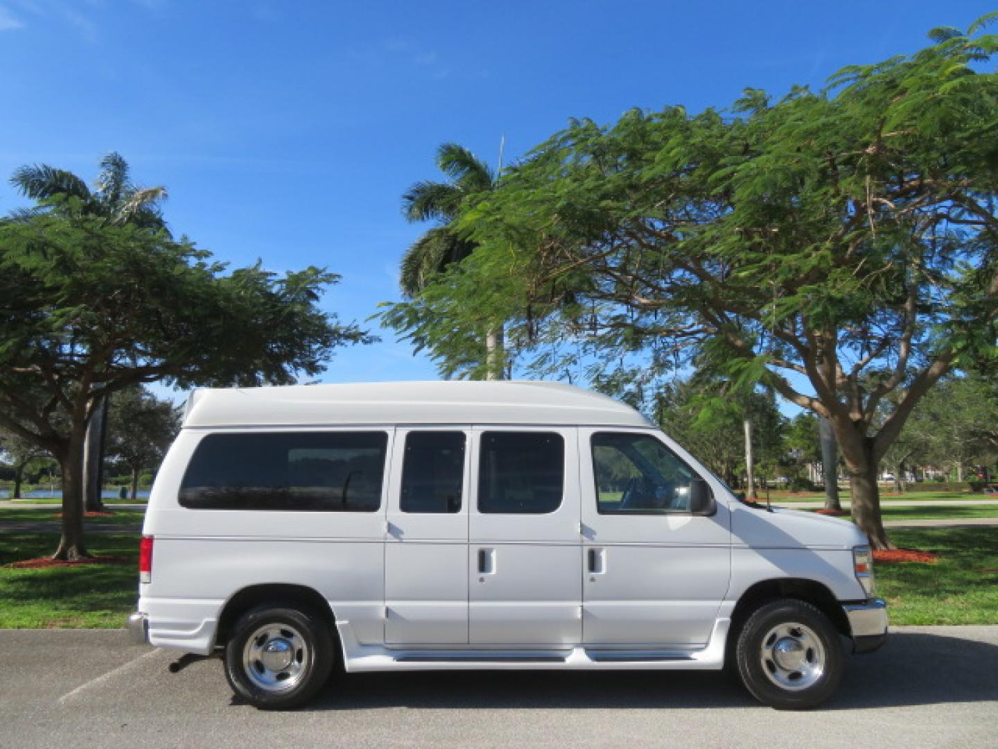 2013 White /Gray Ford E-Series Van E-150 (1FTNE1EL8DD) with an 5.4L V8 SOHC 16V FFV engine, 4-Speed Automatic transmission, located at 4301 Oak Circle #19, Boca Raton, FL, 33431, (954) 561-2499, 26.388472, -80.084045 - You are looking at a Gorgeous 2013 Ford Econoline High Top Rear Entry High Top Handicap Wheelchair Conversion van Tuscany VMI with 35K Original Miles, Ricon S Series 600LB Power Rear Entry Wheelchair Lift, , Q Straint Tie Downs Included, Room for 2 Wheelchairs, Hard Rubber Flooring, Window Shades, A - Photo#7
