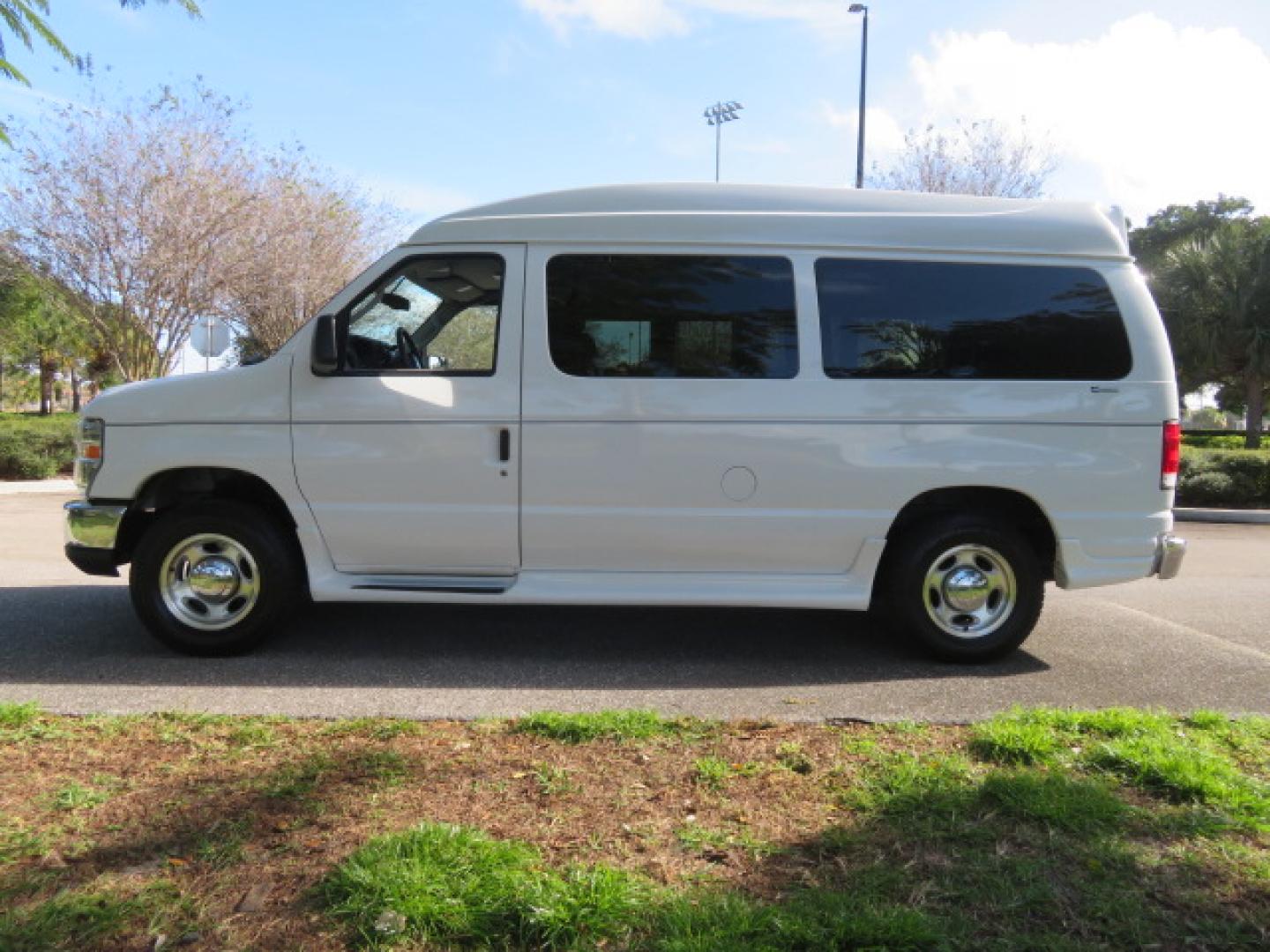 2013 White /Gray Ford E-Series Van E-150 (1FTNE1EL8DD) with an 5.4L V8 SOHC 16V FFV engine, 4-Speed Automatic transmission, located at 4301 Oak Circle #19, Boca Raton, FL, 33431, (954) 561-2499, 26.388472, -80.084045 - You are looking at a Gorgeous 2013 Ford Econoline High Top Rear Entry High Top Handicap Wheelchair Conversion van Tuscany VMI with 35K Original Miles, Ricon S Series 600LB Power Rear Entry Wheelchair Lift, , Q Straint Tie Downs Included, Room for 2 Wheelchairs, Hard Rubber Flooring, Window Shades, A - Photo#14