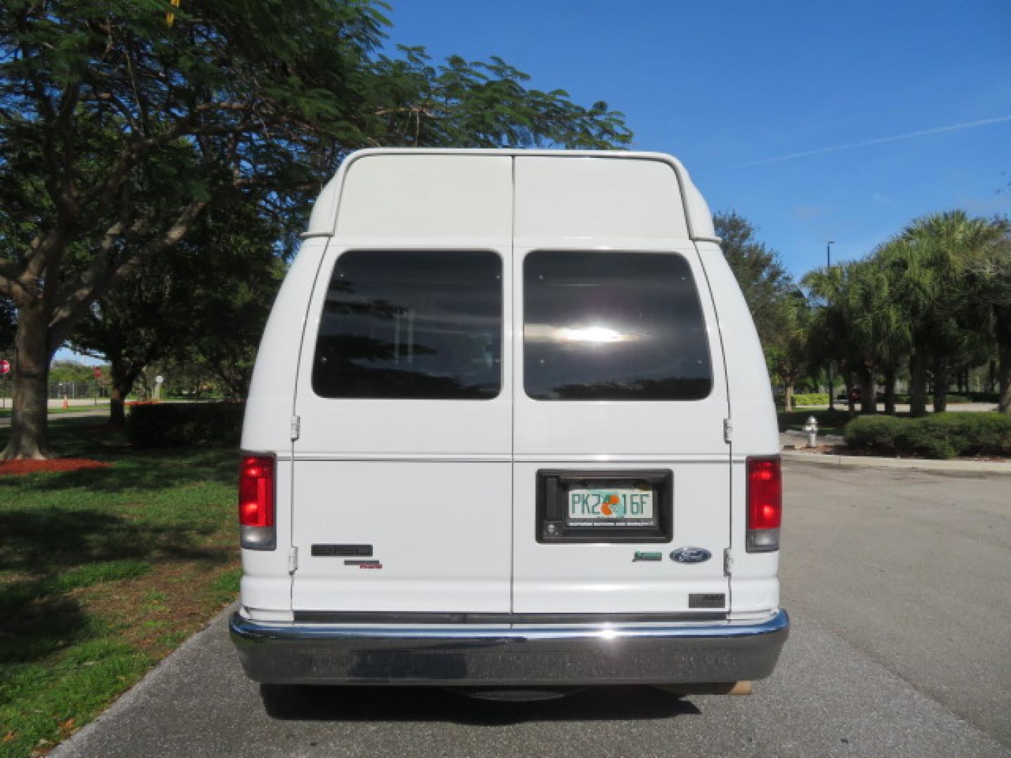 2013 White /Gray Ford E-Series Van E-150 (1FTNE1EL8DD) with an 5.4L V8 SOHC 16V FFV engine, 4-Speed Automatic transmission, located at 4301 Oak Circle #19, Boca Raton, FL, 33431, (954) 561-2499, 26.388472, -80.084045 - You are looking at a Gorgeous 2013 Ford Econoline High Top Rear Entry High Top Handicap Wheelchair Conversion van Tuscany VMI with 35K Original Miles, Ricon S Series 600LB Power Rear Entry Wheelchair Lift, , Q Straint Tie Downs Included, Room for 2 Wheelchairs, Hard Rubber Flooring, Window Shades, A - Photo#16
