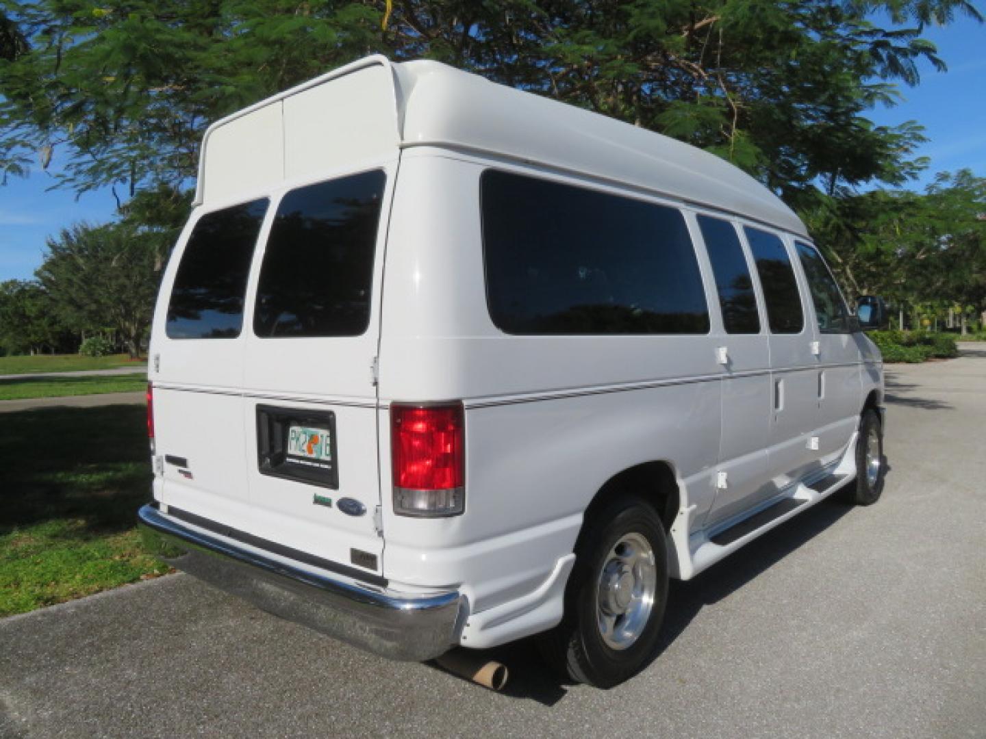 2013 White /Gray Ford E-Series Van E-150 (1FTNE1EL8DD) with an 5.4L V8 SOHC 16V FFV engine, 4-Speed Automatic transmission, located at 4301 Oak Circle #19, Boca Raton, FL, 33431, (954) 561-2499, 26.388472, -80.084045 - You are looking at a Gorgeous 2013 Ford Econoline High Top Rear Entry High Top Handicap Wheelchair Conversion van Tuscany VMI with 35K Original Miles, Ricon S Series 600LB Power Rear Entry Wheelchair Lift, , Q Straint Tie Downs Included, Room for 2 Wheelchairs, Hard Rubber Flooring, Window Shades, A - Photo#18