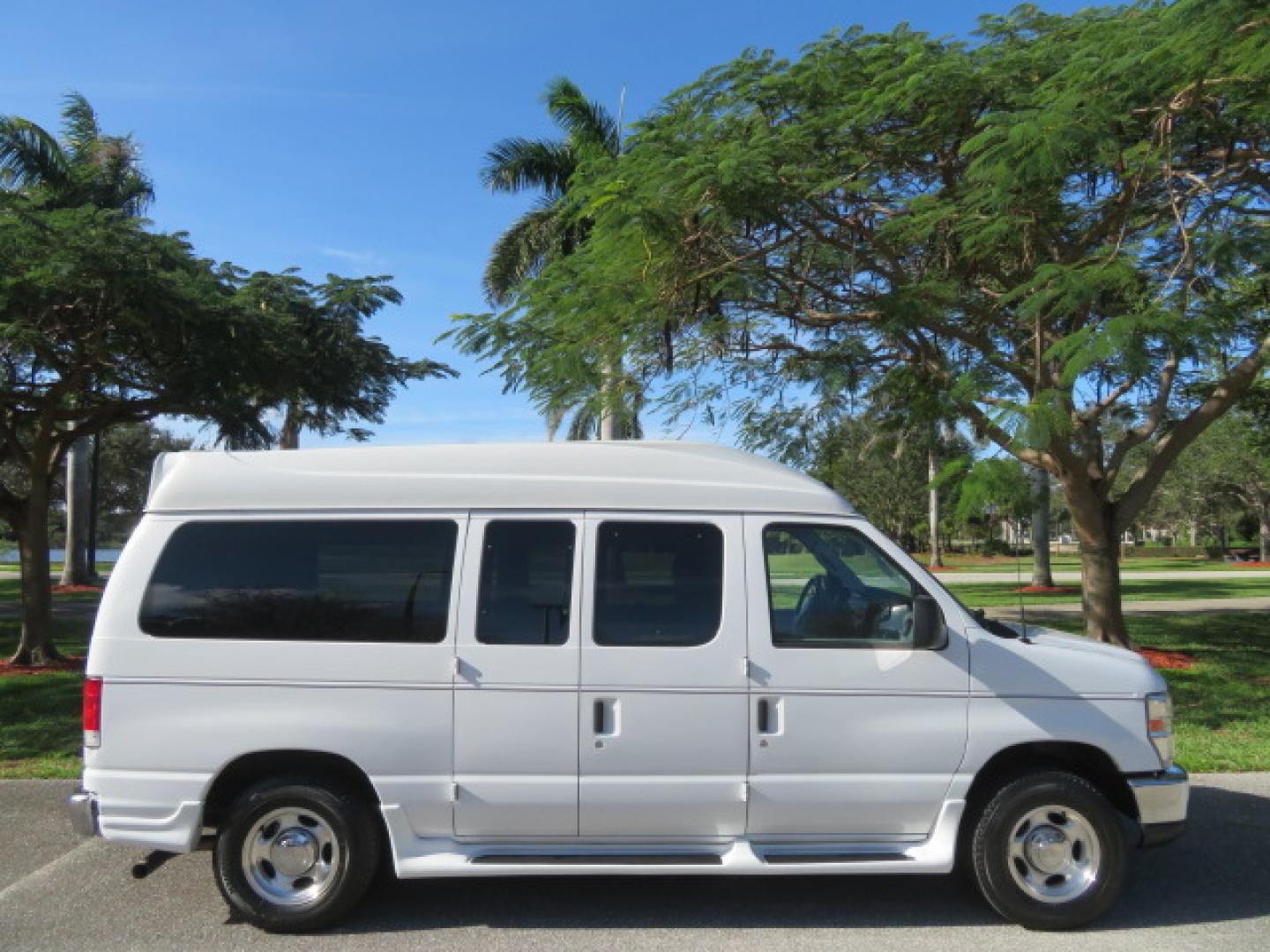 2013 White /Gray Ford E-Series Van E-150 (1FTNE1EL8DD) with an 5.4L V8 SOHC 16V FFV engine, 4-Speed Automatic transmission, located at 4301 Oak Circle #19, Boca Raton, FL, 33431, (954) 561-2499, 26.388472, -80.084045 - You are looking at a Gorgeous 2013 Ford Econoline High Top Rear Entry High Top Handicap Wheelchair Conversion van Tuscany VMI with 35K Original Miles, Ricon S Series 600LB Power Rear Entry Wheelchair Lift, , Q Straint Tie Downs Included, Room for 2 Wheelchairs, Hard Rubber Flooring, Window Shades, A - Photo#20