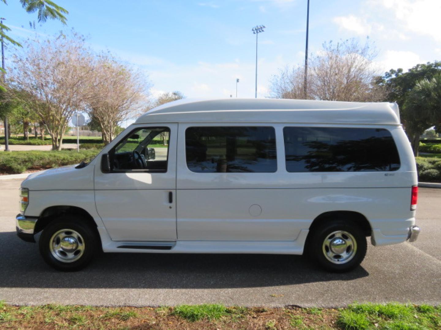2013 White /Gray Ford E-Series Van E-150 (1FTNE1EL8DD) with an 5.4L V8 SOHC 16V FFV engine, 4-Speed Automatic transmission, located at 4301 Oak Circle #19, Boca Raton, FL, 33431, (954) 561-2499, 26.388472, -80.084045 - You are looking at a Gorgeous 2013 Ford Econoline High Top Rear Entry High Top Handicap Wheelchair Conversion van Tuscany VMI with 35K Original Miles, Ricon S Series 600LB Power Rear Entry Wheelchair Lift, , Q Straint Tie Downs Included, Room for 2 Wheelchairs, Hard Rubber Flooring, Window Shades, A - Photo#24