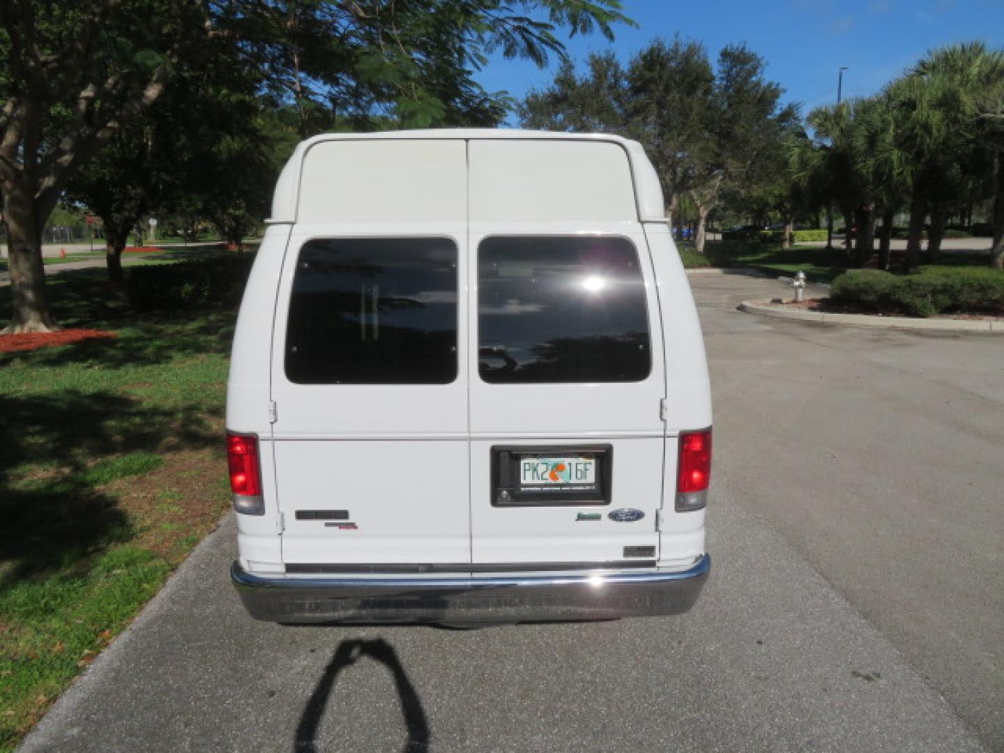 2013 White /Gray Ford E-Series Van E-150 (1FTNE1EL8DD) with an 5.4L V8 SOHC 16V FFV engine, 4-Speed Automatic transmission, located at 4301 Oak Circle #19, Boca Raton, FL, 33431, (954) 561-2499, 26.388472, -80.084045 - You are looking at a Gorgeous 2013 Ford Econoline High Top Rear Entry High Top Handicap Wheelchair Conversion van Tuscany VMI with 35K Original Miles, Ricon S Series 600LB Power Rear Entry Wheelchair Lift, , Q Straint Tie Downs Included, Room for 2 Wheelchairs, Hard Rubber Flooring, Window Shades, A - Photo#26