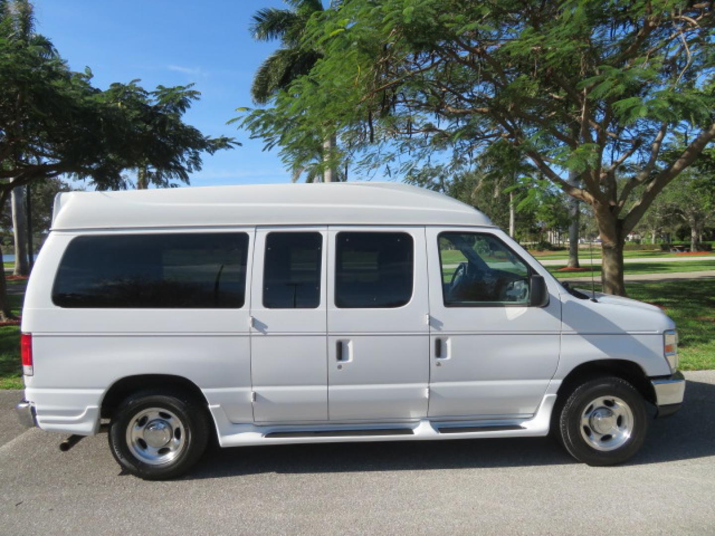 2013 White /Gray Ford E-Series Van E-150 (1FTNE1EL8DD) with an 5.4L V8 SOHC 16V FFV engine, 4-Speed Automatic transmission, located at 4301 Oak Circle #19, Boca Raton, FL, 33431, (954) 561-2499, 26.388472, -80.084045 - You are looking at a Gorgeous 2013 Ford Econoline High Top Rear Entry High Top Handicap Wheelchair Conversion van Tuscany VMI with 35K Original Miles, Ricon S Series 600LB Power Rear Entry Wheelchair Lift, , Q Straint Tie Downs Included, Room for 2 Wheelchairs, Hard Rubber Flooring, Window Shades, A - Photo#28