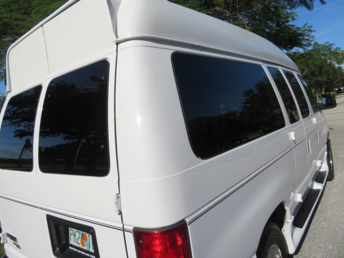 2013 White /Gray Ford E-Series Van E-150 (1FTNE1EL8DD) with an 5.4L V8 SOHC 16V FFV engine, 4-Speed Automatic transmission, located at 4301 Oak Circle #19, Boca Raton, FL, 33431, (954) 561-2499, 26.388472, -80.084045 - You are looking at a Gorgeous 2013 Ford Econoline High Top Rear Entry High Top Handicap Wheelchair Conversion van Tuscany VMI with 35K Original Miles, Ricon S Series 600LB Power Rear Entry Wheelchair Lift, , Q Straint Tie Downs Included, Room for 2 Wheelchairs, Hard Rubber Flooring, Window Shades, A - Photo#32