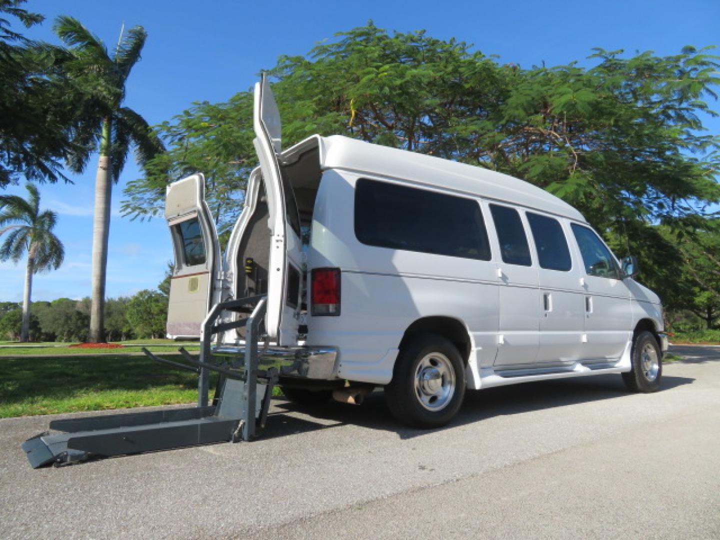2013 White /Gray Ford E-Series Van E-150 (1FTNE1EL8DD) with an 5.4L V8 SOHC 16V FFV engine, 4-Speed Automatic transmission, located at 4301 Oak Circle #19, Boca Raton, FL, 33431, (954) 561-2499, 26.388472, -80.084045 - You are looking at a Gorgeous 2013 Ford Econoline High Top Rear Entry High Top Handicap Wheelchair Conversion van Tuscany VMI with 35K Original Miles, Ricon S Series 600LB Power Rear Entry Wheelchair Lift, , Q Straint Tie Downs Included, Room for 2 Wheelchairs, Hard Rubber Flooring, Window Shades, A - Photo#42