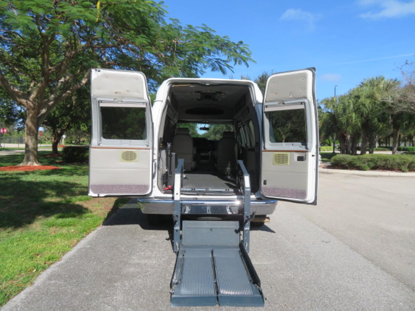 2013 White /Gray Ford E-Series Van E-150 (1FTNE1EL8DD) with an 5.4L V8 SOHC 16V FFV engine, 4-Speed Automatic transmission, located at 4301 Oak Circle #19, Boca Raton, FL, 33431, (954) 561-2499, 26.388472, -80.084045 - You are looking at a Gorgeous 2013 Ford Econoline High Top Rear Entry High Top Handicap Wheelchair Conversion van Tuscany VMI with 35K Original Miles, Ricon S Series 600LB Power Rear Entry Wheelchair Lift, , Q Straint Tie Downs Included, Room for 2 Wheelchairs, Hard Rubber Flooring, Window Shades, A - Photo#1