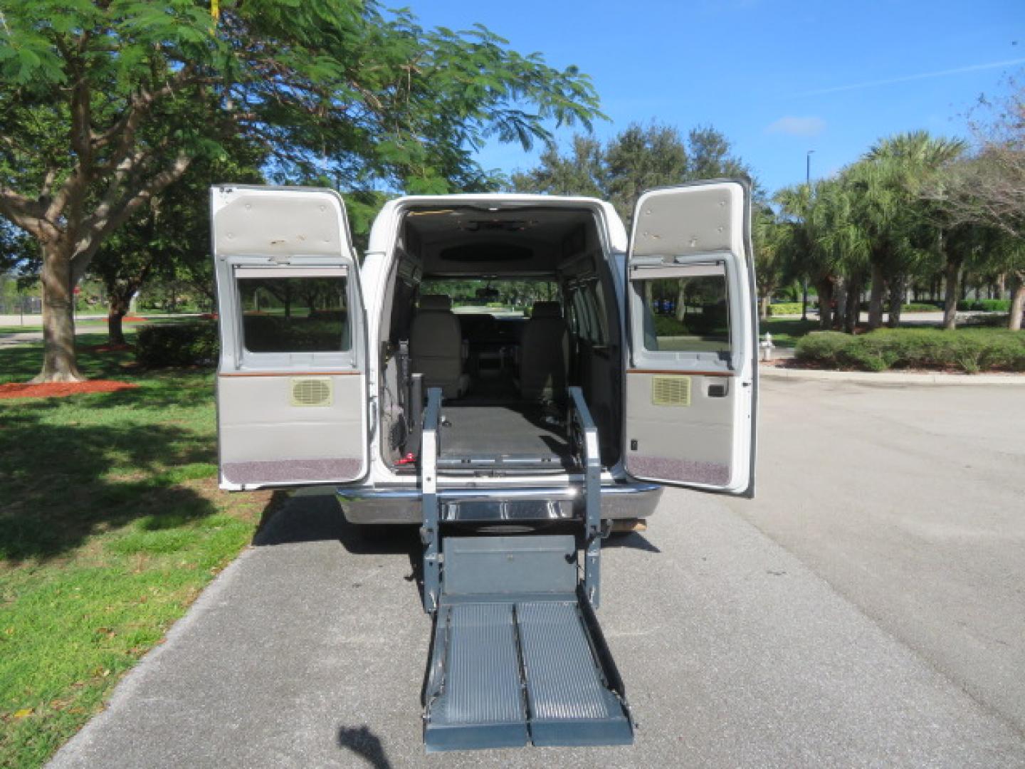 2013 White /Gray Ford E-Series Van E-150 (1FTNE1EL8DD) with an 5.4L V8 SOHC 16V FFV engine, 4-Speed Automatic transmission, located at 4301 Oak Circle #19, Boca Raton, FL, 33431, (954) 561-2499, 26.388472, -80.084045 - You are looking at a Gorgeous 2013 Ford Econoline High Top Rear Entry High Top Handicap Wheelchair Conversion van Tuscany VMI with 35K Original Miles, Ricon S Series 600LB Power Rear Entry Wheelchair Lift, , Q Straint Tie Downs Included, Room for 2 Wheelchairs, Hard Rubber Flooring, Window Shades, A - Photo#45