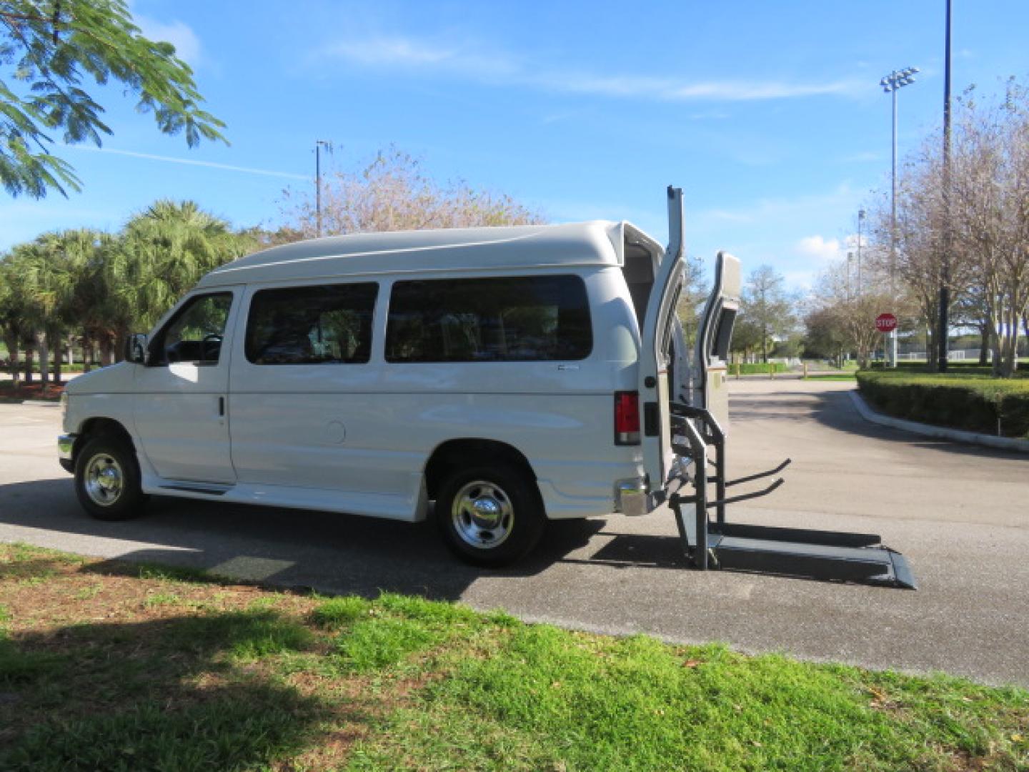 2013 White /Gray Ford E-Series Van E-150 (1FTNE1EL8DD) with an 5.4L V8 SOHC 16V FFV engine, 4-Speed Automatic transmission, located at 4301 Oak Circle #19, Boca Raton, FL, 33431, (954) 561-2499, 26.388472, -80.084045 - You are looking at a Gorgeous 2013 Ford Econoline High Top Rear Entry High Top Handicap Wheelchair Conversion van Tuscany VMI with 35K Original Miles, Ricon S Series 600LB Power Rear Entry Wheelchair Lift, , Q Straint Tie Downs Included, Room for 2 Wheelchairs, Hard Rubber Flooring, Window Shades, A - Photo#47
