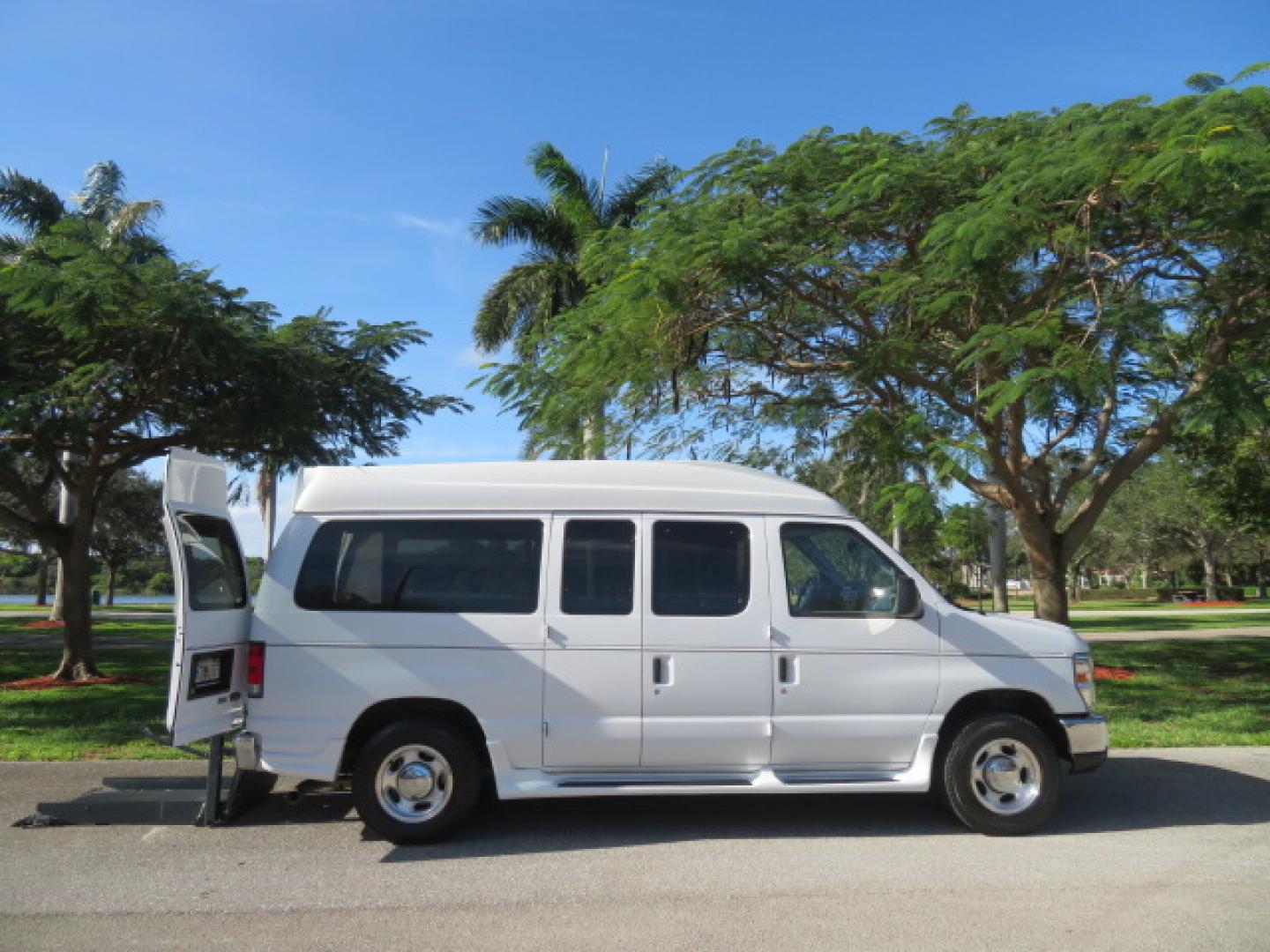 2013 White /Gray Ford E-Series Van E-150 (1FTNE1EL8DD) with an 5.4L V8 SOHC 16V FFV engine, 4-Speed Automatic transmission, located at 4301 Oak Circle #19, Boca Raton, FL, 33431, (954) 561-2499, 26.388472, -80.084045 - You are looking at a Gorgeous 2013 Ford Econoline High Top Rear Entry High Top Handicap Wheelchair Conversion van Tuscany VMI with 35K Original Miles, Ricon S Series 600LB Power Rear Entry Wheelchair Lift, , Q Straint Tie Downs Included, Room for 2 Wheelchairs, Hard Rubber Flooring, Window Shades, A - Photo#3