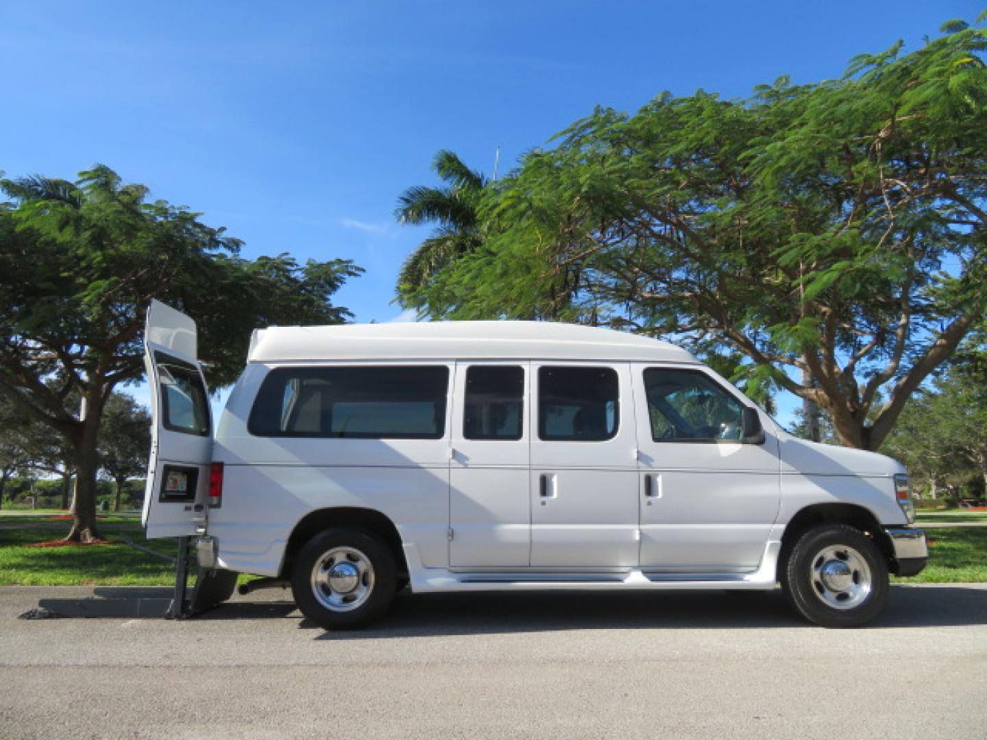 2013 White /Gray Ford E-Series Van E-150 (1FTNE1EL8DD) with an 5.4L V8 SOHC 16V FFV engine, 4-Speed Automatic transmission, located at 4301 Oak Circle #19, Boca Raton, FL, 33431, (954) 561-2499, 26.388472, -80.084045 - You are looking at a Gorgeous 2013 Ford Econoline High Top Rear Entry High Top Handicap Wheelchair Conversion van Tuscany VMI with 35K Original Miles, Ricon S Series 600LB Power Rear Entry Wheelchair Lift, , Q Straint Tie Downs Included, Room for 2 Wheelchairs, Hard Rubber Flooring, Window Shades, A - Photo#48