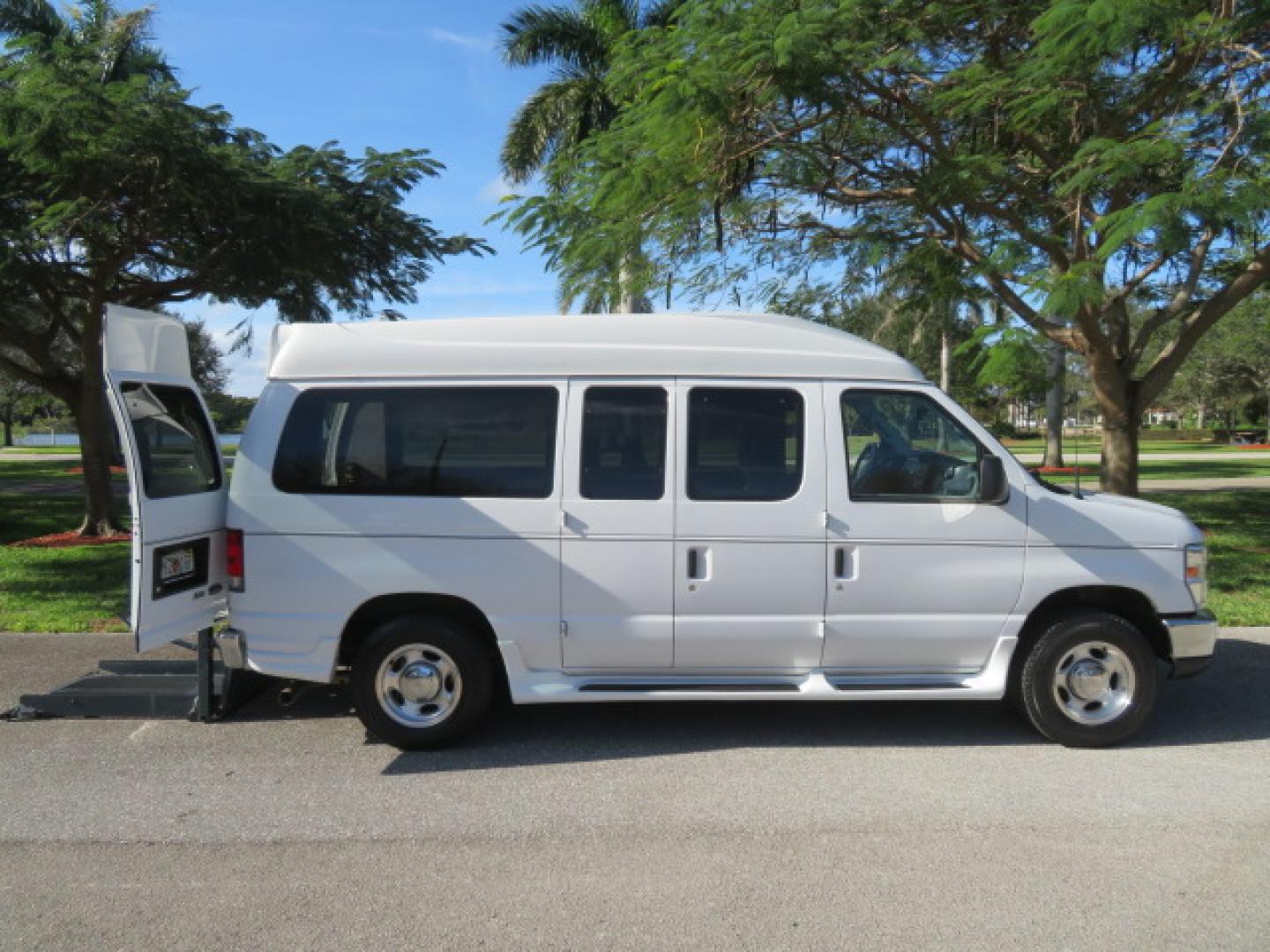2013 White /Gray Ford E-Series Van E-150 (1FTNE1EL8DD) with an 5.4L V8 SOHC 16V FFV engine, 4-Speed Automatic transmission, located at 4301 Oak Circle #19, Boca Raton, FL, 33431, (954) 561-2499, 26.388472, -80.084045 - You are looking at a Gorgeous 2013 Ford Econoline High Top Rear Entry High Top Handicap Wheelchair Conversion van Tuscany VMI with 35K Original Miles, Ricon S Series 600LB Power Rear Entry Wheelchair Lift, , Q Straint Tie Downs Included, Room for 2 Wheelchairs, Hard Rubber Flooring, Window Shades, A - Photo#50