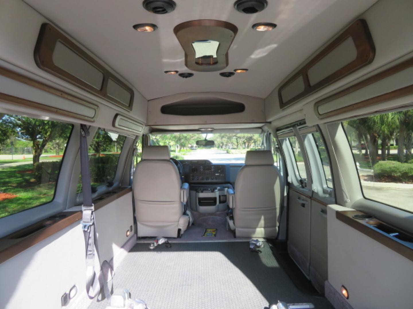 2013 White /Gray Ford E-Series Van E-150 (1FTNE1EL8DD) with an 5.4L V8 SOHC 16V FFV engine, 4-Speed Automatic transmission, located at 4301 Oak Circle #19, Boca Raton, FL, 33431, (954) 561-2499, 26.388472, -80.084045 - You are looking at a Gorgeous 2013 Ford Econoline High Top Rear Entry High Top Handicap Wheelchair Conversion van Tuscany VMI with 35K Original Miles, Ricon S Series 600LB Power Rear Entry Wheelchair Lift, , Q Straint Tie Downs Included, Room for 2 Wheelchairs, Hard Rubber Flooring, Window Shades, A - Photo#51