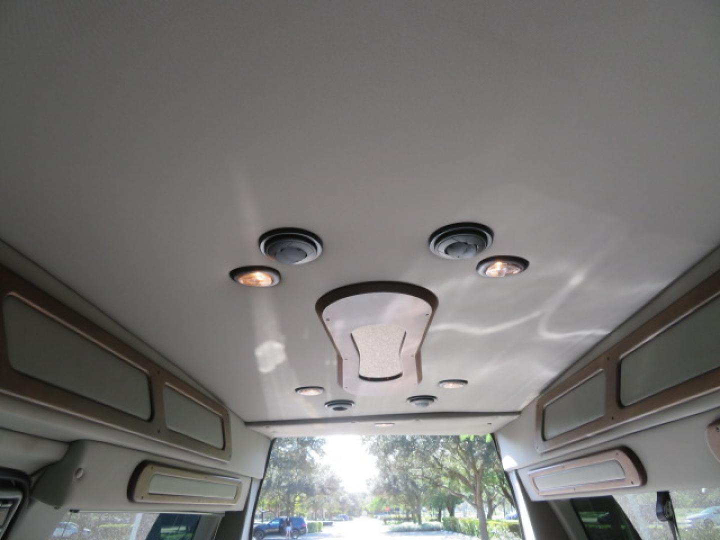 2013 White /Gray Ford E-Series Van E-150 (1FTNE1EL8DD) with an 5.4L V8 SOHC 16V FFV engine, 4-Speed Automatic transmission, located at 4301 Oak Circle #19, Boca Raton, FL, 33431, (954) 561-2499, 26.388472, -80.084045 - You are looking at a Gorgeous 2013 Ford Econoline High Top Rear Entry High Top Handicap Wheelchair Conversion van Tuscany VMI with 35K Original Miles, Ricon S Series 600LB Power Rear Entry Wheelchair Lift, , Q Straint Tie Downs Included, Room for 2 Wheelchairs, Hard Rubber Flooring, Window Shades, A - Photo#52