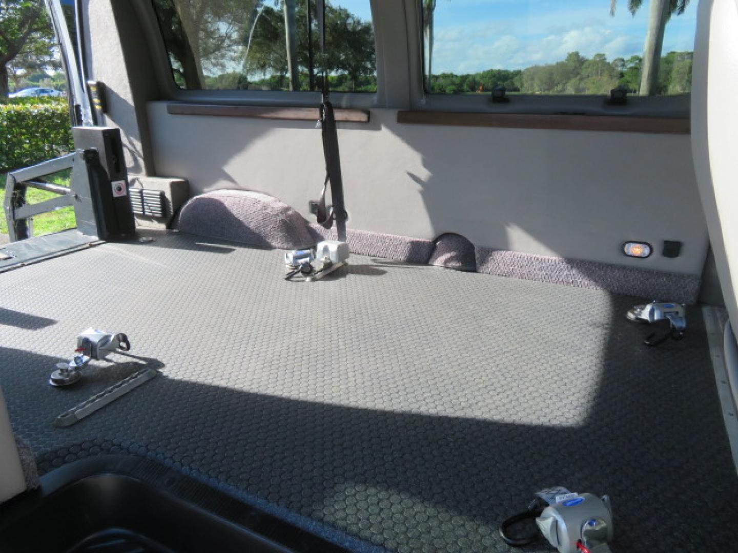 2013 White /Gray Ford E-Series Van E-150 (1FTNE1EL8DD) with an 5.4L V8 SOHC 16V FFV engine, 4-Speed Automatic transmission, located at 4301 Oak Circle #19, Boca Raton, FL, 33431, (954) 561-2499, 26.388472, -80.084045 - You are looking at a Gorgeous 2013 Ford Econoline High Top Rear Entry High Top Handicap Wheelchair Conversion van Tuscany VMI with 35K Original Miles, Ricon S Series 600LB Power Rear Entry Wheelchair Lift, , Q Straint Tie Downs Included, Room for 2 Wheelchairs, Hard Rubber Flooring, Window Shades, A - Photo#58