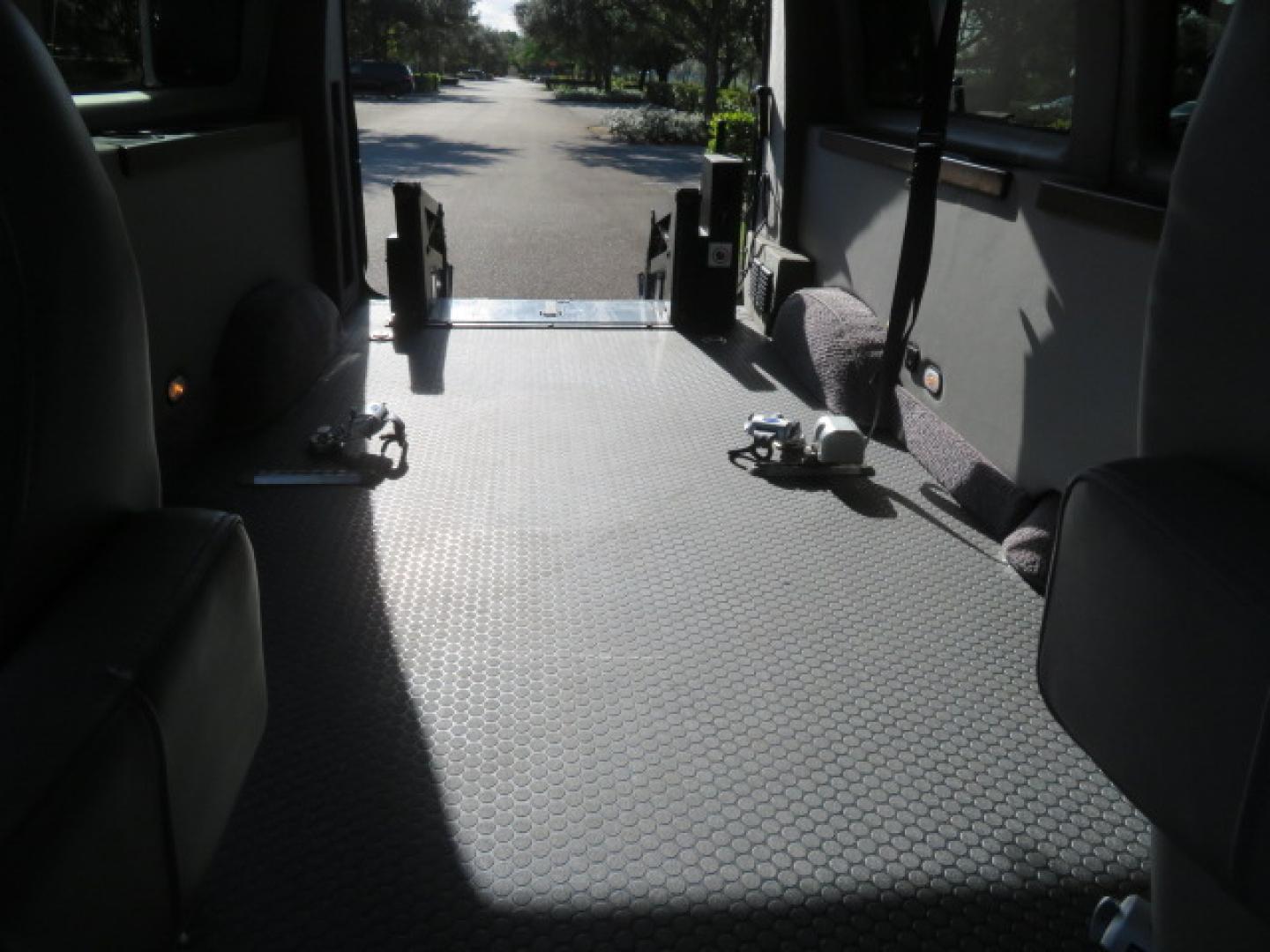 2013 White /Gray Ford E-Series Van E-150 (1FTNE1EL8DD) with an 5.4L V8 SOHC 16V FFV engine, 4-Speed Automatic transmission, located at 4301 Oak Circle #19, Boca Raton, FL, 33431, (954) 561-2499, 26.388472, -80.084045 - You are looking at a Gorgeous 2013 Ford Econoline High Top Rear Entry High Top Handicap Wheelchair Conversion van Tuscany VMI with 35K Original Miles, Ricon S Series 600LB Power Rear Entry Wheelchair Lift, , Q Straint Tie Downs Included, Room for 2 Wheelchairs, Hard Rubber Flooring, Window Shades, A - Photo#59