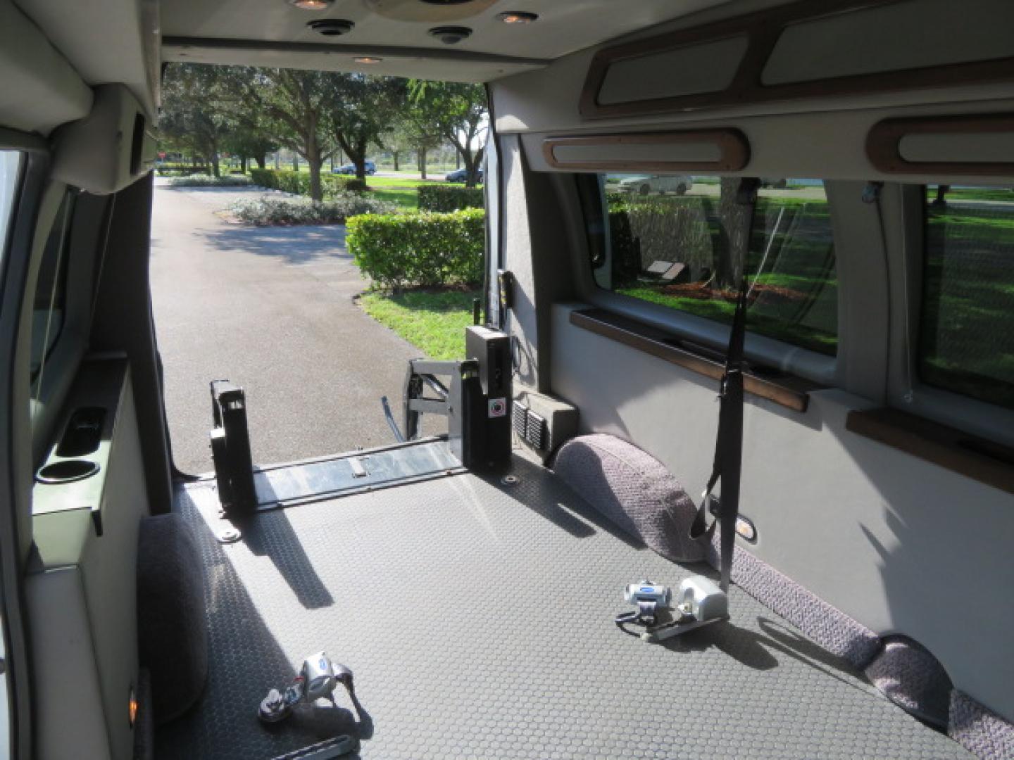 2013 White /Gray Ford E-Series Van E-150 (1FTNE1EL8DD) with an 5.4L V8 SOHC 16V FFV engine, 4-Speed Automatic transmission, located at 4301 Oak Circle #19, Boca Raton, FL, 33431, (954) 561-2499, 26.388472, -80.084045 - You are looking at a Gorgeous 2013 Ford Econoline High Top Rear Entry High Top Handicap Wheelchair Conversion van Tuscany VMI with 35K Original Miles, Ricon S Series 600LB Power Rear Entry Wheelchair Lift, , Q Straint Tie Downs Included, Room for 2 Wheelchairs, Hard Rubber Flooring, Window Shades, A - Photo#60