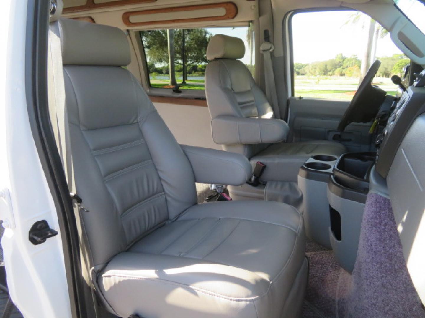 2013 White /Gray Ford E-Series Van E-150 (1FTNE1EL8DD) with an 5.4L V8 SOHC 16V FFV engine, 4-Speed Automatic transmission, located at 4301 Oak Circle #19, Boca Raton, FL, 33431, (954) 561-2499, 26.388472, -80.084045 - You are looking at a Gorgeous 2013 Ford Econoline High Top Rear Entry High Top Handicap Wheelchair Conversion van Tuscany VMI with 35K Original Miles, Ricon S Series 600LB Power Rear Entry Wheelchair Lift, , Q Straint Tie Downs Included, Room for 2 Wheelchairs, Hard Rubber Flooring, Window Shades, A - Photo#61