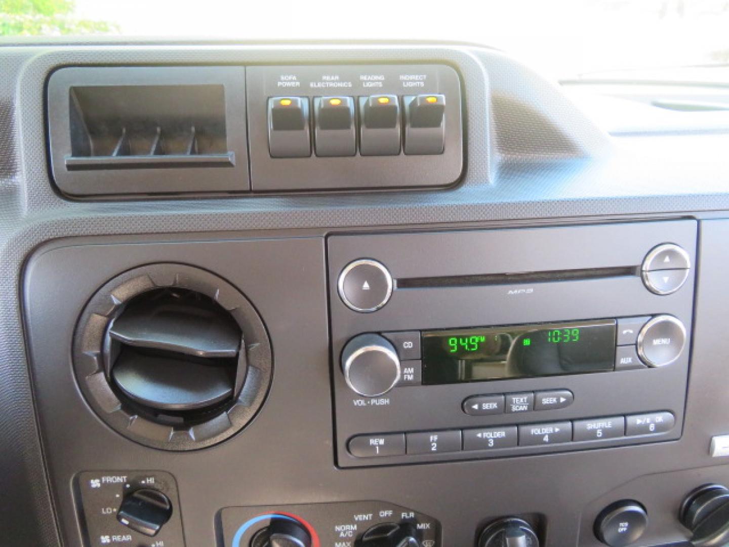 2013 White /Gray Ford E-Series Van E-150 (1FTNE1EL8DD) with an 5.4L V8 SOHC 16V FFV engine, 4-Speed Automatic transmission, located at 4301 Oak Circle #19, Boca Raton, FL, 33431, (954) 561-2499, 26.388472, -80.084045 - You are looking at a Gorgeous 2013 Ford Econoline High Top Rear Entry High Top Handicap Wheelchair Conversion van Tuscany VMI with 35K Original Miles, Ricon S Series 600LB Power Rear Entry Wheelchair Lift, , Q Straint Tie Downs Included, Room for 2 Wheelchairs, Hard Rubber Flooring, Window Shades, A - Photo#67