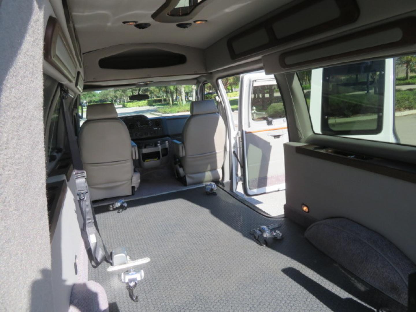 2013 White /Gray Ford E-Series Van E-150 (1FTNE1EL8DD) with an 5.4L V8 SOHC 16V FFV engine, 4-Speed Automatic transmission, located at 4301 Oak Circle #19, Boca Raton, FL, 33431, (954) 561-2499, 26.388472, -80.084045 - You are looking at a Gorgeous 2013 Ford Econoline High Top Rear Entry High Top Handicap Wheelchair Conversion van Tuscany VMI with 35K Original Miles, Ricon S Series 600LB Power Rear Entry Wheelchair Lift, , Q Straint Tie Downs Included, Room for 2 Wheelchairs, Hard Rubber Flooring, Window Shades, A - Photo#74