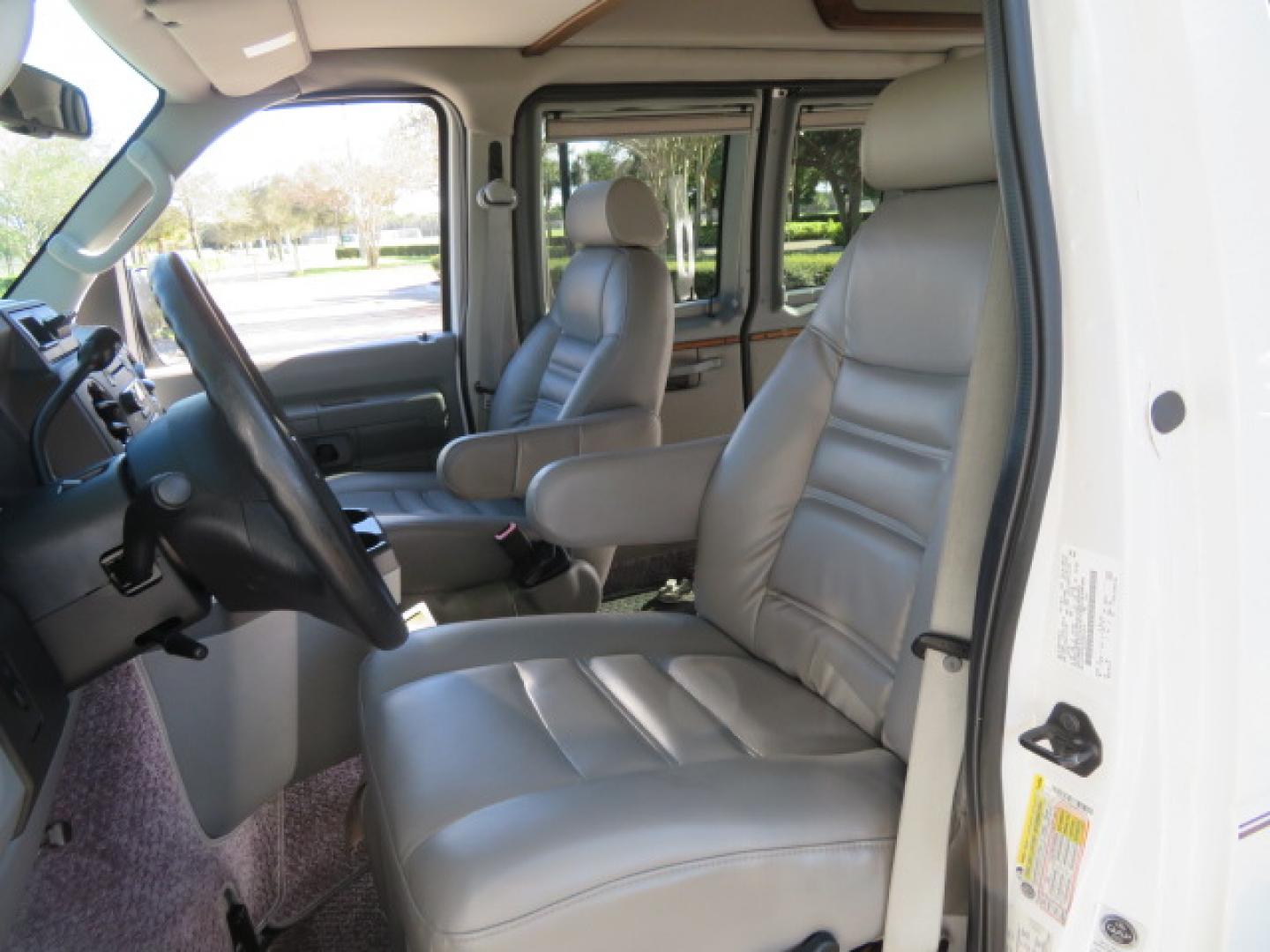2013 White /Gray Ford E-Series Van E-150 (1FTNE1EL8DD) with an 5.4L V8 SOHC 16V FFV engine, 4-Speed Automatic transmission, located at 4301 Oak Circle #19, Boca Raton, FL, 33431, (954) 561-2499, 26.388472, -80.084045 - You are looking at a Gorgeous 2013 Ford Econoline High Top Rear Entry High Top Handicap Wheelchair Conversion van Tuscany VMI with 35K Original Miles, Ricon S Series 600LB Power Rear Entry Wheelchair Lift, , Q Straint Tie Downs Included, Room for 2 Wheelchairs, Hard Rubber Flooring, Window Shades, A - Photo#78