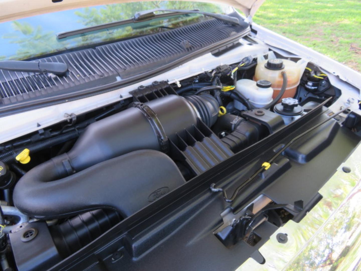 2013 White /Gray Ford E-Series Van E-150 (1FTNE1EL8DD) with an 5.4L V8 SOHC 16V FFV engine, 4-Speed Automatic transmission, located at 4301 Oak Circle #19, Boca Raton, FL, 33431, (954) 561-2499, 26.388472, -80.084045 - You are looking at a Gorgeous 2013 Ford Econoline High Top Rear Entry High Top Handicap Wheelchair Conversion van Tuscany VMI with 35K Original Miles, Ricon S Series 600LB Power Rear Entry Wheelchair Lift, , Q Straint Tie Downs Included, Room for 2 Wheelchairs, Hard Rubber Flooring, Window Shades, A - Photo#83