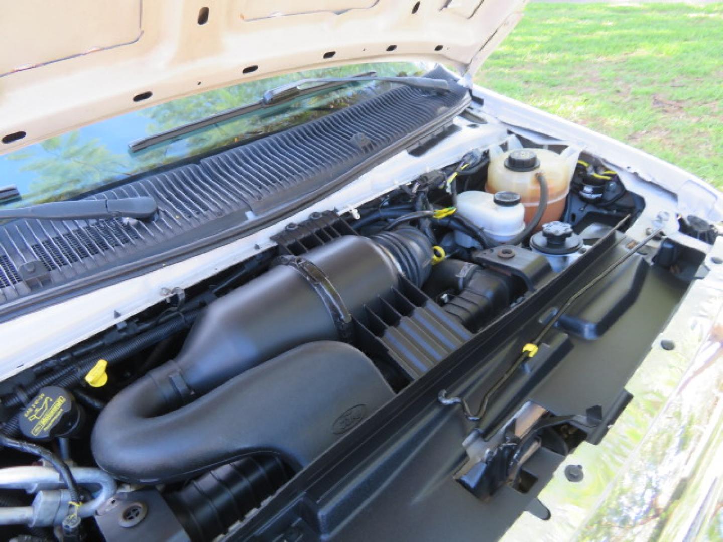 2013 White /Gray Ford E-Series Van E-150 (1FTNE1EL8DD) with an 5.4L V8 SOHC 16V FFV engine, 4-Speed Automatic transmission, located at 4301 Oak Circle #19, Boca Raton, FL, 33431, (954) 561-2499, 26.388472, -80.084045 - You are looking at a Gorgeous 2013 Ford Econoline High Top Rear Entry High Top Handicap Wheelchair Conversion van Tuscany VMI with 35K Original Miles, Ricon S Series 600LB Power Rear Entry Wheelchair Lift, , Q Straint Tie Downs Included, Room for 2 Wheelchairs, Hard Rubber Flooring, Window Shades, A - Photo#85