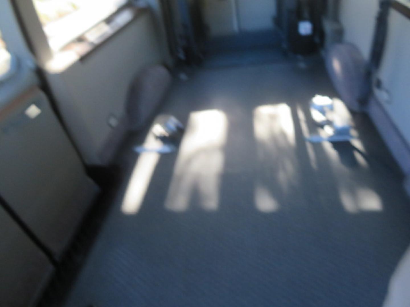 2013 White /Gray Ford E-Series Van E-150 (1FTNE1EL8DD) with an 5.4L V8 SOHC 16V FFV engine, 4-Speed Automatic transmission, located at 4301 Oak Circle #19, Boca Raton, FL, 33431, (954) 561-2499, 26.388472, -80.084045 - You are looking at a Gorgeous 2013 Ford Econoline High Top Rear Entry High Top Handicap Wheelchair Conversion van Tuscany VMI with 35K Original Miles, Ricon S Series 600LB Power Rear Entry Wheelchair Lift, , Q Straint Tie Downs Included, Room for 2 Wheelchairs, Hard Rubber Flooring, Window Shades, A - Photo#86