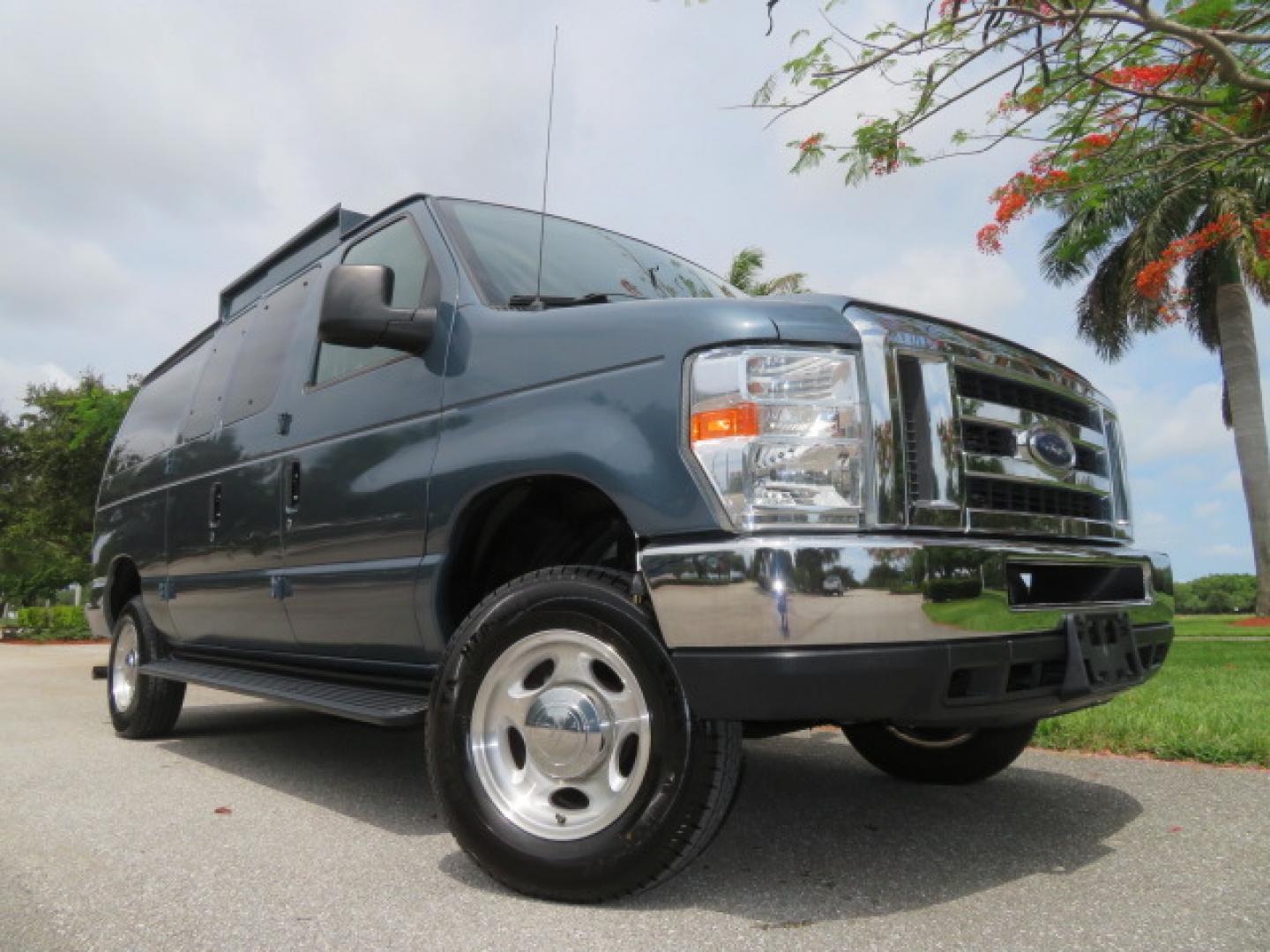 2014 Northsky Blue /Gray Ford E-Series Wagon E-150 XLT (1FMNE1BL1ED) with an 5.4L V8 SOHC 16V FFV engine, 4-Speed Automatic transmission, located at 4301 Oak Circle #19, Boca Raton, FL, 33431, (954) 561-2499, 26.388472, -80.084045 - You are looking at a Stunning 2014 Ford Econoline NorCal Max Handicap Wheelchair Conversion Van with 53K Original Miles, 9 Inch Fully Lowered Floor, Remote Control Power Side Entry Doors, Raised Side Entry Doors, Q Straint Tie Down System with Ratchet Straps, Quick Release Front Seats, VMI 600LB Sid - Photo#3