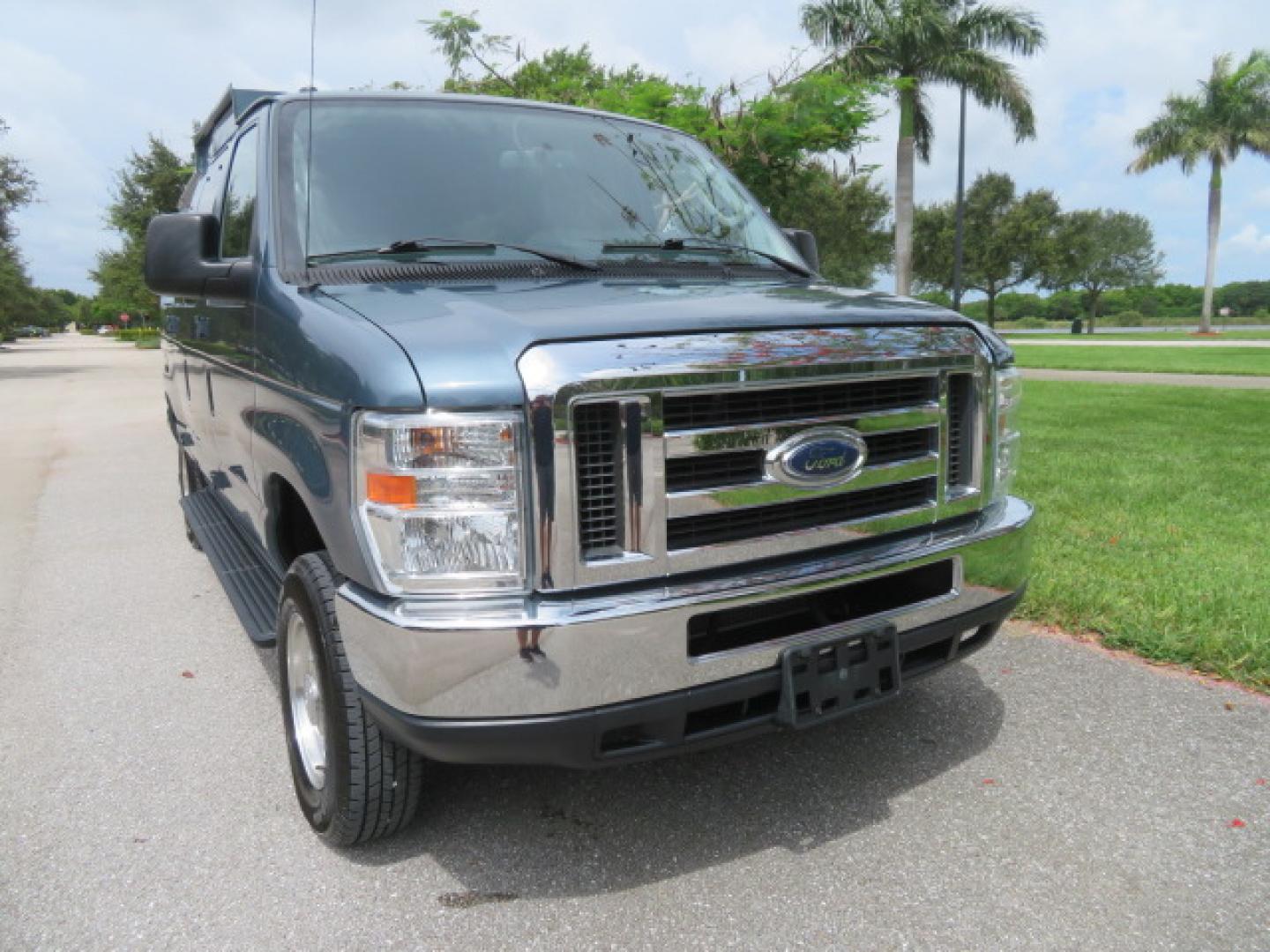 2014 Northsky Blue /Gray Ford E-Series Wagon E-150 XLT (1FMNE1BL1ED) with an 5.4L V8 SOHC 16V FFV engine, 4-Speed Automatic transmission, located at 4301 Oak Circle #19, Boca Raton, FL, 33431, (954) 561-2499, 26.388472, -80.084045 - You are looking at a Stunning 2014 Ford Econoline NorCal Max Handicap Wheelchair Conversion Van with 53K Original Miles, 9 Inch Fully Lowered Floor, Remote Control Power Side Entry Doors, Raised Side Entry Doors, Q Straint Tie Down System with Ratchet Straps, Quick Release Front Seats, VMI 600LB Sid - Photo#9