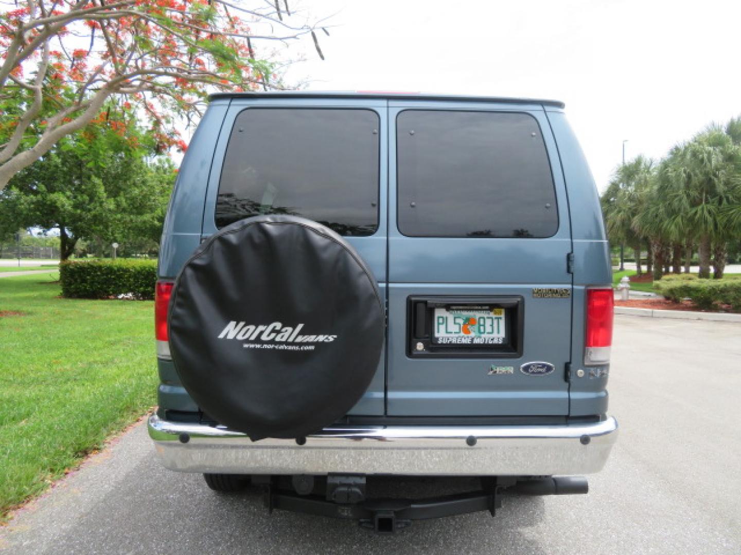 2014 Northsky Blue /Gray Ford E-Series Wagon E-150 XLT (1FMNE1BL1ED) with an 5.4L V8 SOHC 16V FFV engine, 4-Speed Automatic transmission, located at 4301 Oak Circle #19, Boca Raton, FL, 33431, (954) 561-2499, 26.388472, -80.084045 - You are looking at a Stunning 2014 Ford Econoline NorCal Max Handicap Wheelchair Conversion Van with 53K Original Miles, 9 Inch Fully Lowered Floor, Remote Control Power Side Entry Doors, Raised Side Entry Doors, Q Straint Tie Down System with Ratchet Straps, Quick Release Front Seats, VMI 600LB Sid - Photo#16