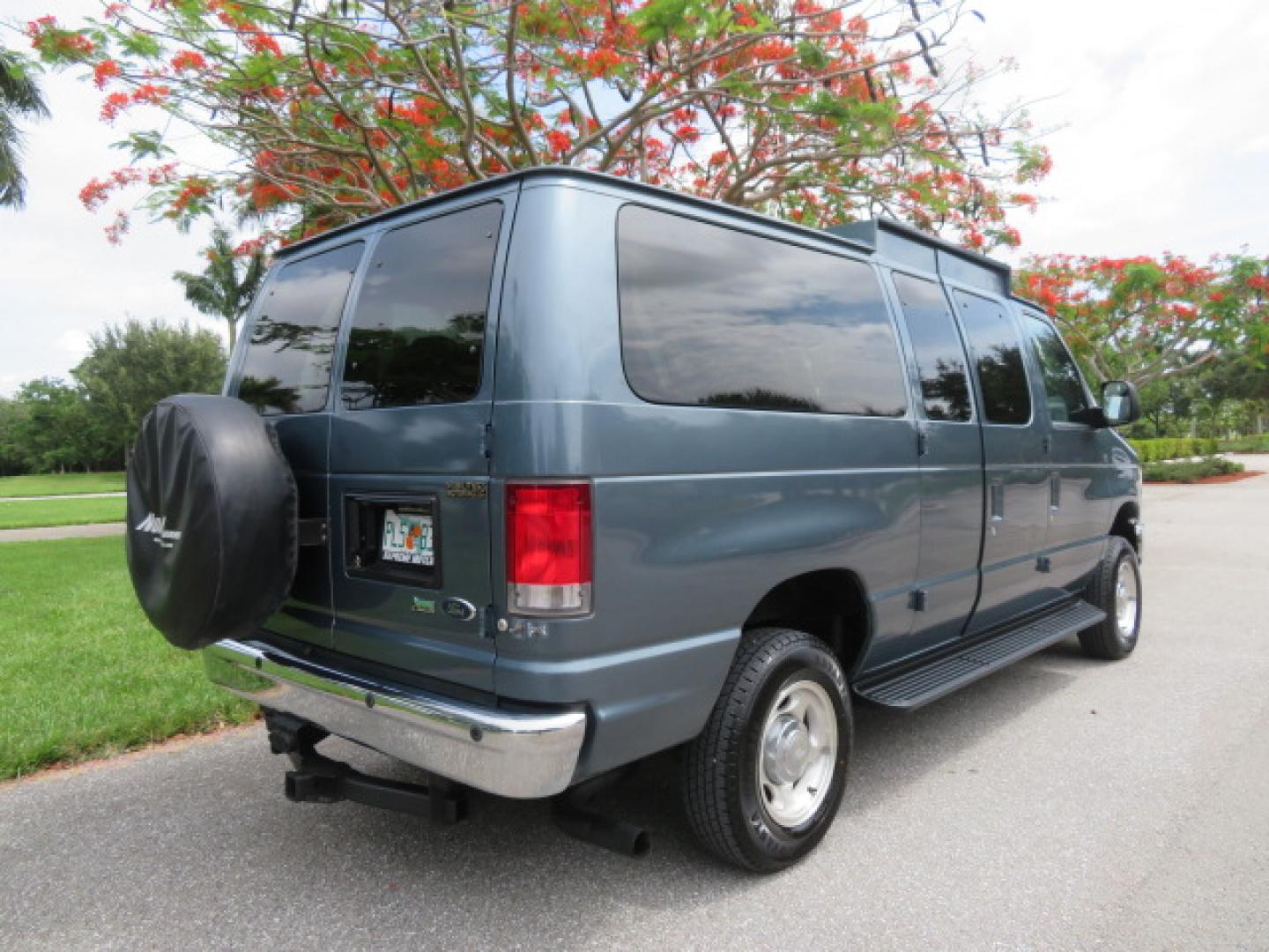 2014 Northsky Blue /Gray Ford E-Series Wagon E-150 XLT (1FMNE1BL1ED) with an 5.4L V8 SOHC 16V FFV engine, 4-Speed Automatic transmission, located at 4301 Oak Circle #19, Boca Raton, FL, 33431, (954) 561-2499, 26.388472, -80.084045 - You are looking at a Stunning 2014 Ford Econoline NorCal Max Handicap Wheelchair Conversion Van with 53K Original Miles, 9 Inch Fully Lowered Floor, Remote Control Power Side Entry Doors, Raised Side Entry Doors, Q Straint Tie Down System with Ratchet Straps, Quick Release Front Seats, VMI 600LB Sid - Photo#18