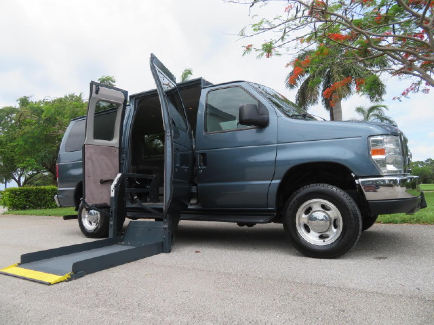 2014 Northsky Blue /Gray Ford E-Series Wagon E-150 XLT (1FMNE1BL1ED) with an 5.4L V8 SOHC 16V FFV engine, 4-Speed Automatic transmission, located at 4301 Oak Circle #19, Boca Raton, FL, 33431, (954) 561-2499, 26.388472, -80.084045 - You are looking at a Stunning 2014 Ford Econoline NorCal Max Handicap Wheelchair Conversion Van with 53K Original Miles, 9 Inch Fully Lowered Floor, Remote Control Power Side Entry Doors, Raised Side Entry Doors, Q Straint Tie Down System with Ratchet Straps, Quick Release Front Seats, VMI 600LB Sid - Photo#0