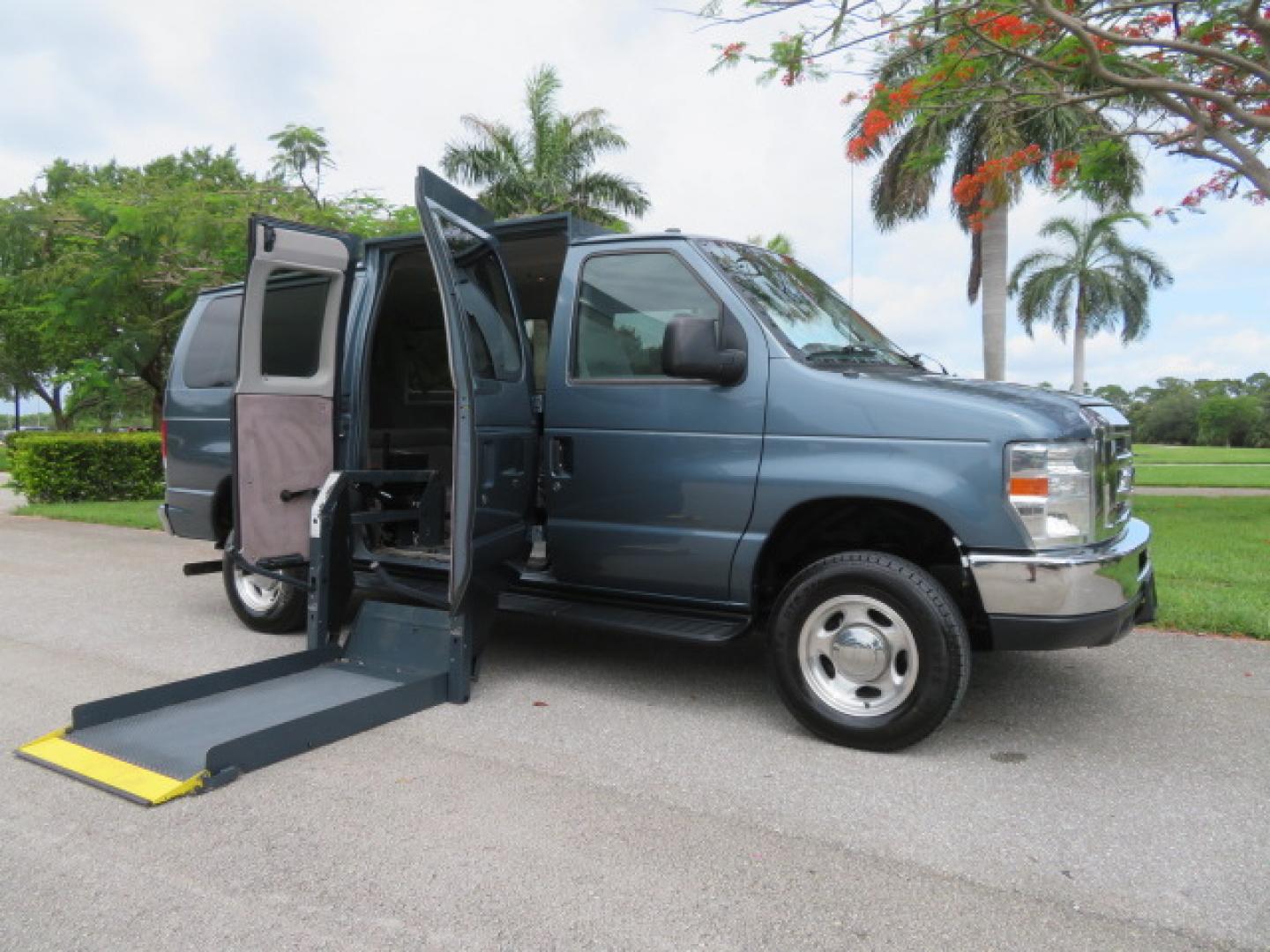 2014 Northsky Blue /Gray Ford E-Series Wagon E-150 XLT (1FMNE1BL1ED) with an 5.4L V8 SOHC 16V FFV engine, 4-Speed Automatic transmission, located at 4301 Oak Circle #19, Boca Raton, FL, 33431, (954) 561-2499, 26.388472, -80.084045 - You are looking at a Stunning 2014 Ford Econoline NorCal Max Handicap Wheelchair Conversion Van with 53K Original Miles, 9 Inch Fully Lowered Floor, Remote Control Power Side Entry Doors, Raised Side Entry Doors, Q Straint Tie Down System with Ratchet Straps, Quick Release Front Seats, VMI 600LB Sid - Photo#45