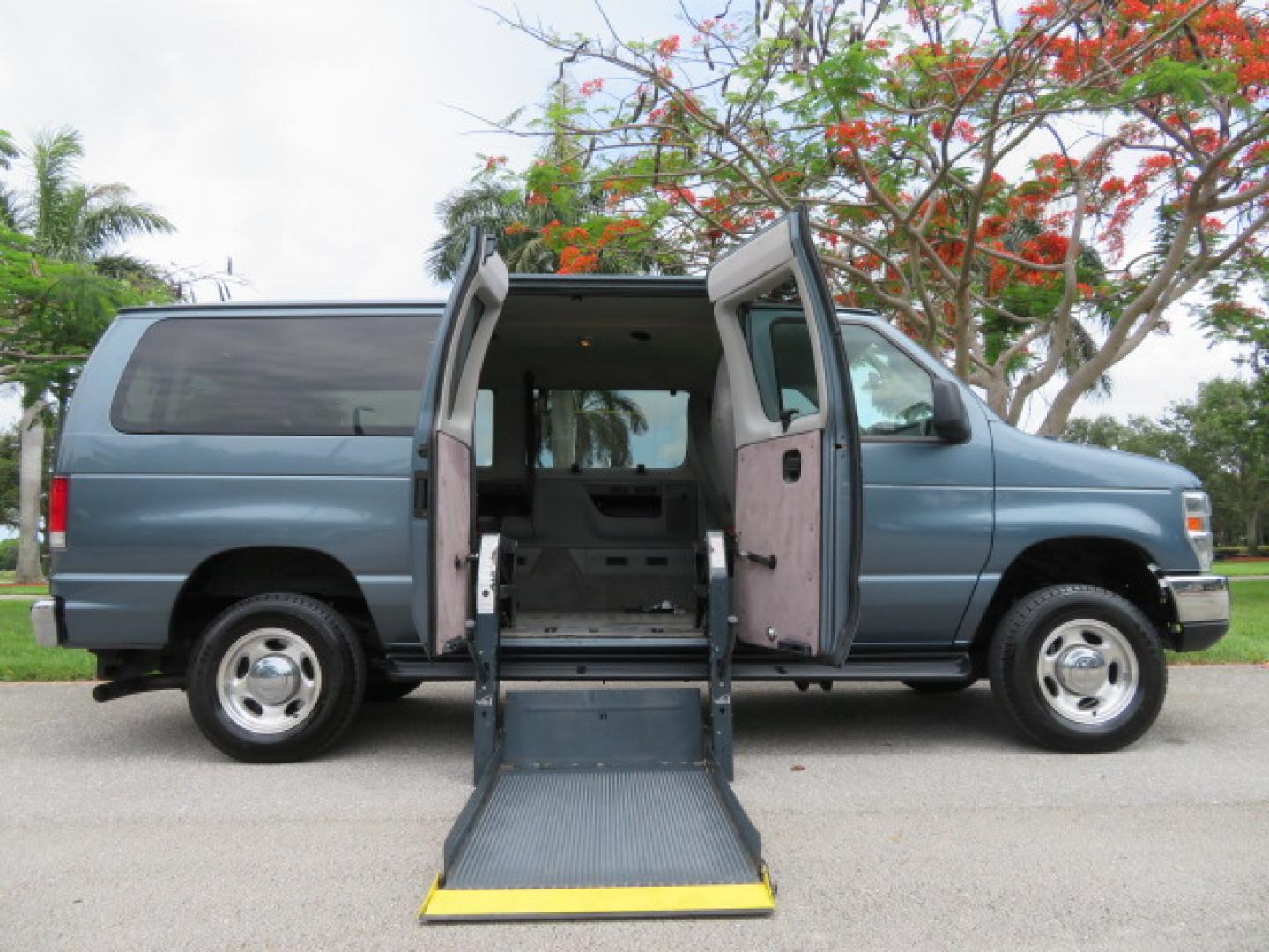 2014 Northsky Blue /Gray Ford E-Series Wagon E-150 XLT (1FMNE1BL1ED) with an 5.4L V8 SOHC 16V FFV engine, 4-Speed Automatic transmission, located at 4301 Oak Circle #19, Boca Raton, FL, 33431, (954) 561-2499, 26.388472, -80.084045 - You are looking at a Stunning 2014 Ford Econoline NorCal Max Handicap Wheelchair Conversion Van with 53K Original Miles, 9 Inch Fully Lowered Floor, Remote Control Power Side Entry Doors, Raised Side Entry Doors, Q Straint Tie Down System with Ratchet Straps, Quick Release Front Seats, VMI 600LB Sid - Photo#47
