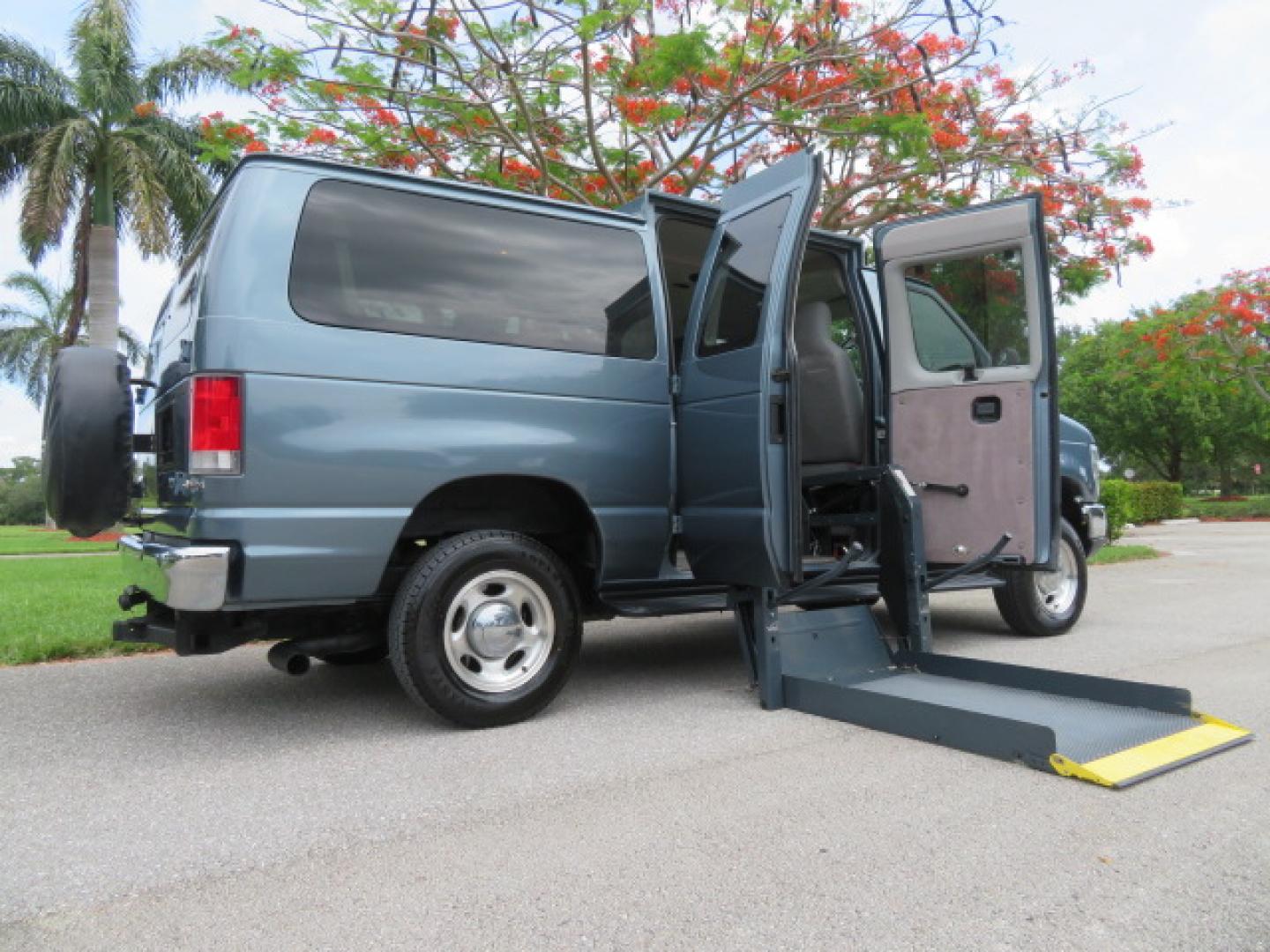 2014 Northsky Blue /Gray Ford E-Series Wagon E-150 XLT (1FMNE1BL1ED) with an 5.4L V8 SOHC 16V FFV engine, 4-Speed Automatic transmission, located at 4301 Oak Circle #19, Boca Raton, FL, 33431, (954) 561-2499, 26.388472, -80.084045 - You are looking at a Stunning 2014 Ford Econoline NorCal Max Handicap Wheelchair Conversion Van with 53K Original Miles, 9 Inch Fully Lowered Floor, Remote Control Power Side Entry Doors, Raised Side Entry Doors, Q Straint Tie Down System with Ratchet Straps, Quick Release Front Seats, VMI 600LB Sid - Photo#49