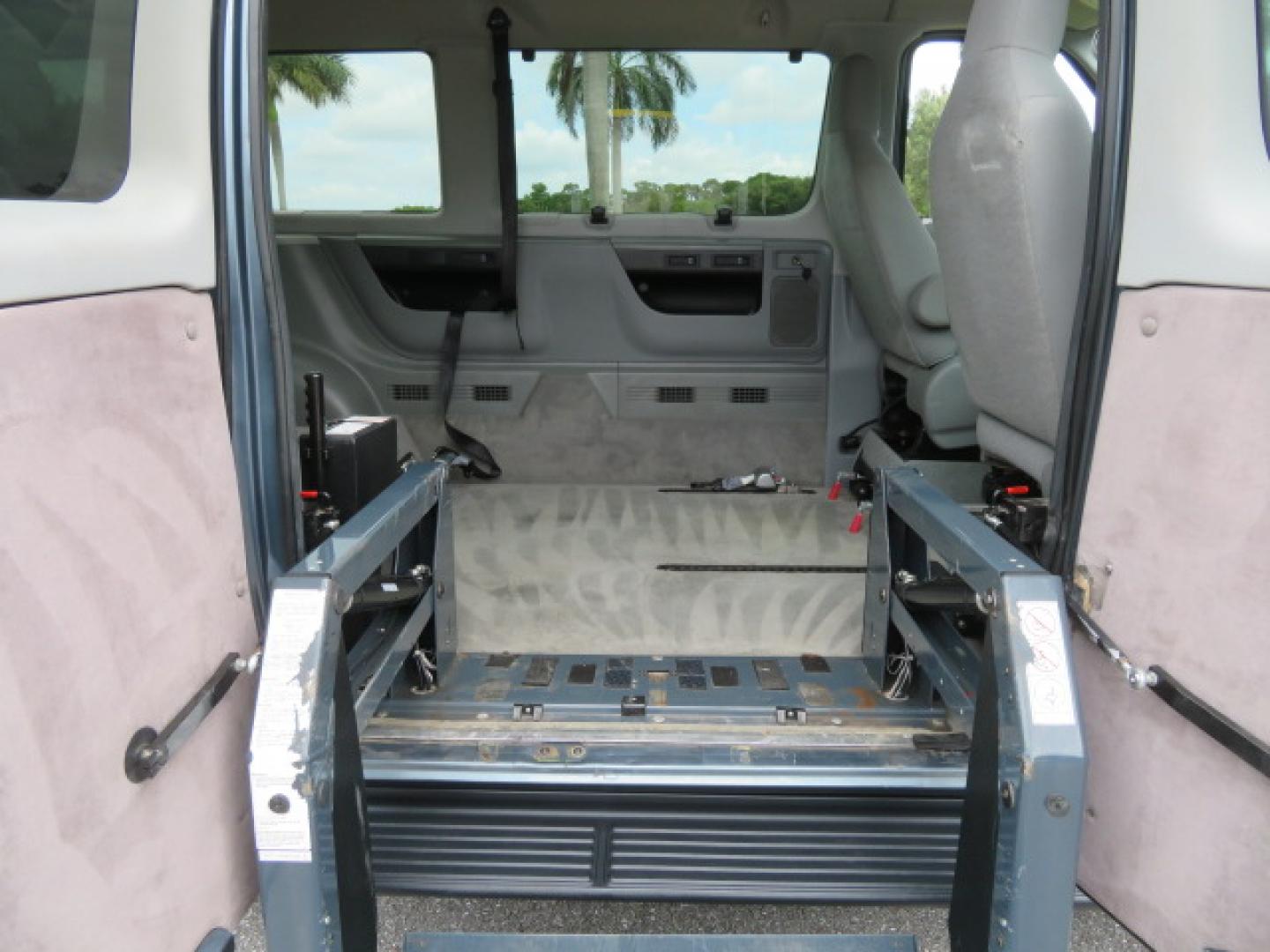 2014 Northsky Blue /Gray Ford E-Series Wagon E-150 XLT (1FMNE1BL1ED) with an 5.4L V8 SOHC 16V FFV engine, 4-Speed Automatic transmission, located at 4301 Oak Circle #19, Boca Raton, FL, 33431, (954) 561-2499, 26.388472, -80.084045 - You are looking at a Stunning 2014 Ford Econoline NorCal Max Handicap Wheelchair Conversion Van with 53K Original Miles, 9 Inch Fully Lowered Floor, Remote Control Power Side Entry Doors, Raised Side Entry Doors, Q Straint Tie Down System with Ratchet Straps, Quick Release Front Seats, VMI 600LB Sid - Photo#51