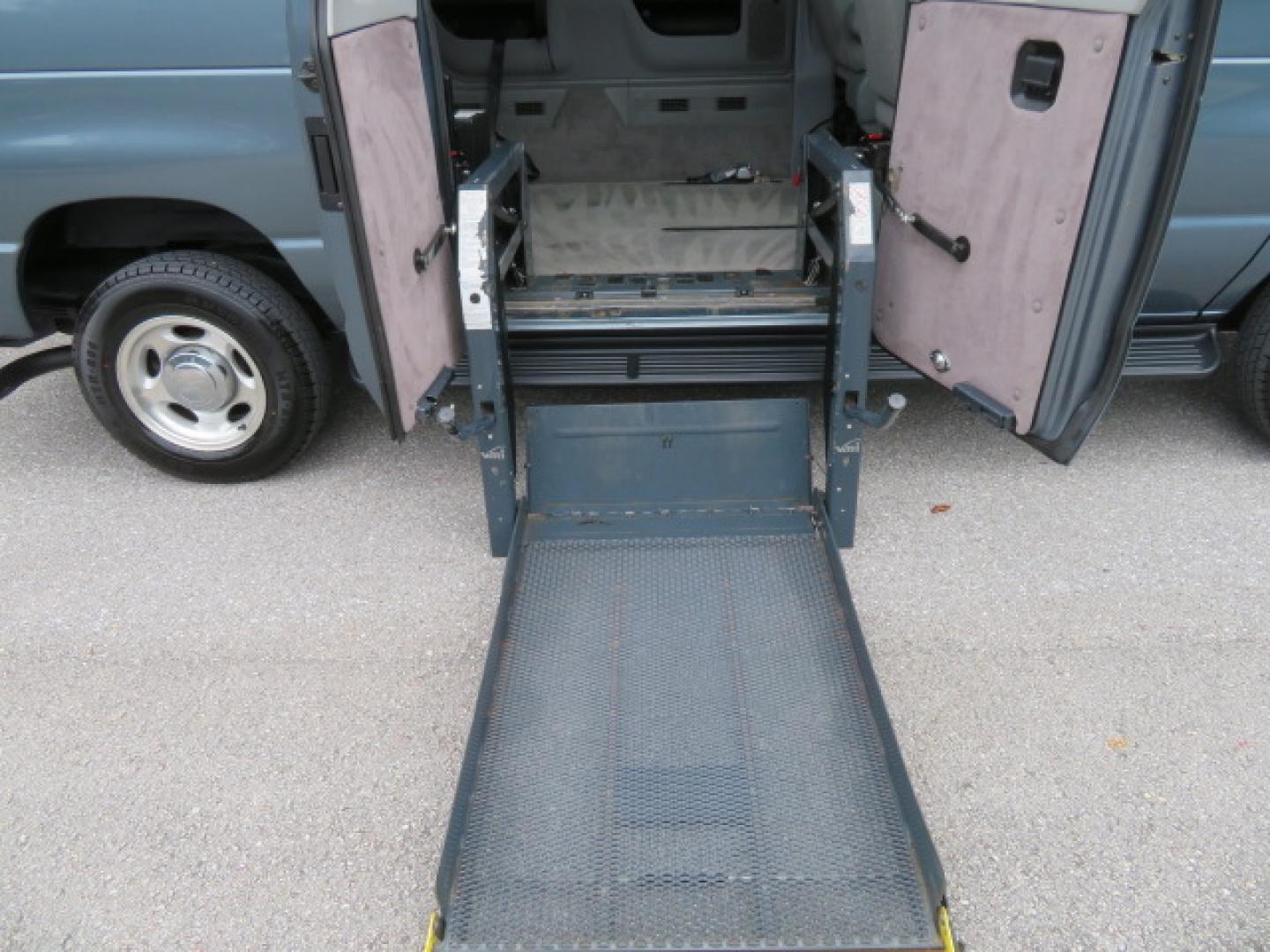 2014 Northsky Blue /Gray Ford E-Series Wagon E-150 XLT (1FMNE1BL1ED) with an 5.4L V8 SOHC 16V FFV engine, 4-Speed Automatic transmission, located at 4301 Oak Circle #19, Boca Raton, FL, 33431, (954) 561-2499, 26.388472, -80.084045 - You are looking at a Stunning 2014 Ford Econoline NorCal Max Handicap Wheelchair Conversion Van with 53K Original Miles, 9 Inch Fully Lowered Floor, Remote Control Power Side Entry Doors, Raised Side Entry Doors, Q Straint Tie Down System with Ratchet Straps, Quick Release Front Seats, VMI 600LB Sid - Photo#50