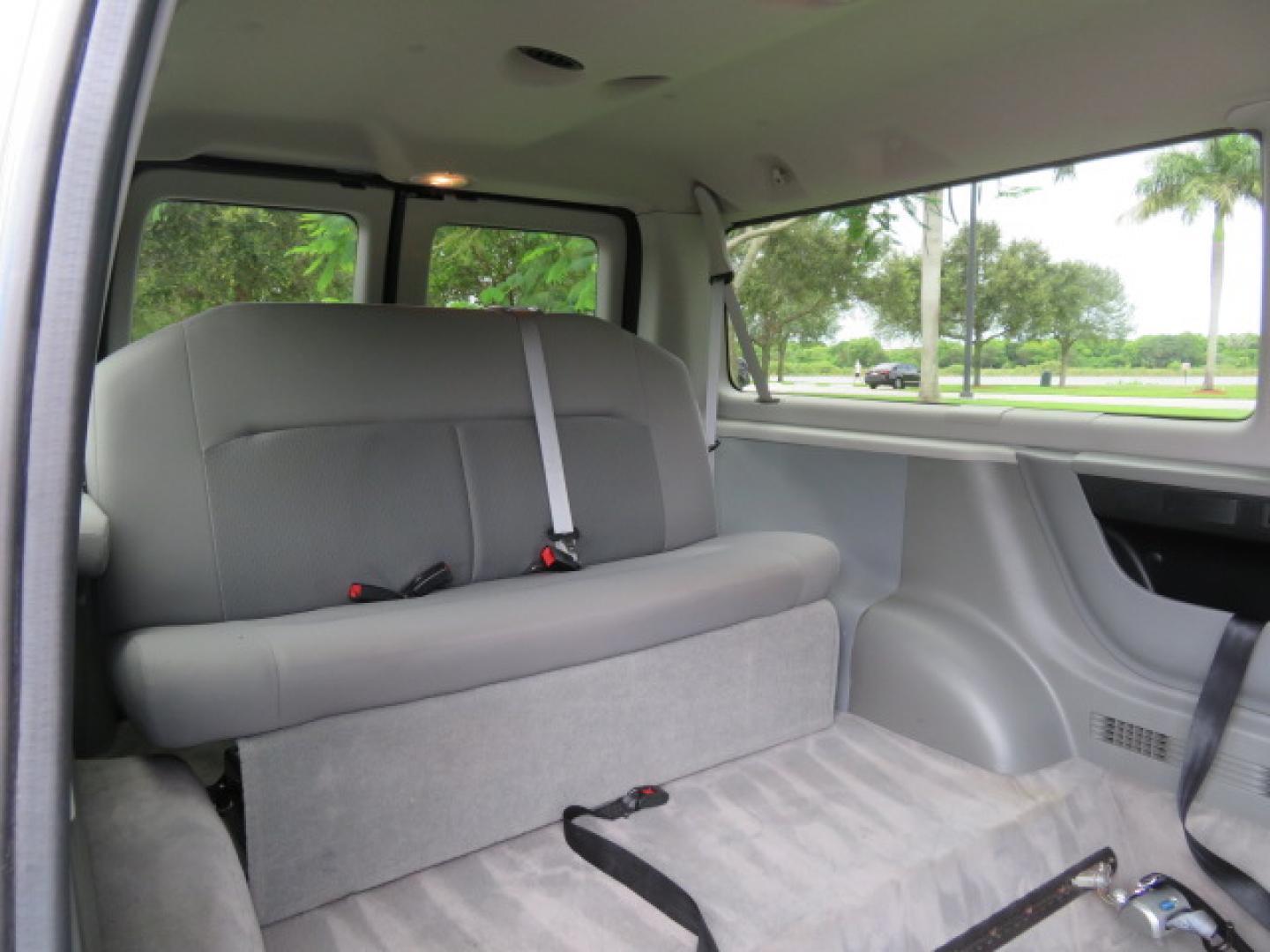 2014 Northsky Blue /Gray Ford E-Series Wagon E-150 XLT (1FMNE1BL1ED) with an 5.4L V8 SOHC 16V FFV engine, 4-Speed Automatic transmission, located at 4301 Oak Circle #19, Boca Raton, FL, 33431, (954) 561-2499, 26.388472, -80.084045 - You are looking at a Stunning 2014 Ford Econoline NorCal Max Handicap Wheelchair Conversion Van with 53K Original Miles, 9 Inch Fully Lowered Floor, Remote Control Power Side Entry Doors, Raised Side Entry Doors, Q Straint Tie Down System with Ratchet Straps, Quick Release Front Seats, VMI 600LB Sid - Photo#55