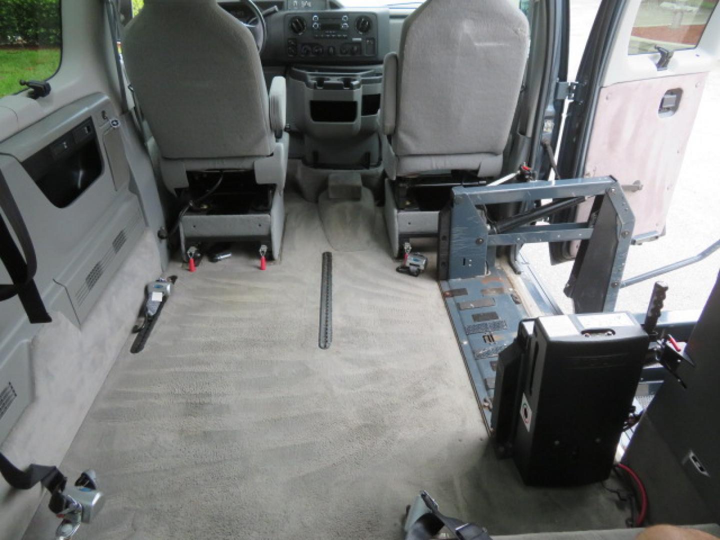 2014 Northsky Blue /Gray Ford E-Series Wagon E-150 XLT (1FMNE1BL1ED) with an 5.4L V8 SOHC 16V FFV engine, 4-Speed Automatic transmission, located at 4301 Oak Circle #19, Boca Raton, FL, 33431, (954) 561-2499, 26.388472, -80.084045 - You are looking at a Stunning 2014 Ford Econoline NorCal Max Handicap Wheelchair Conversion Van with 53K Original Miles, 9 Inch Fully Lowered Floor, Remote Control Power Side Entry Doors, Raised Side Entry Doors, Q Straint Tie Down System with Ratchet Straps, Quick Release Front Seats, VMI 600LB Sid - Photo#56