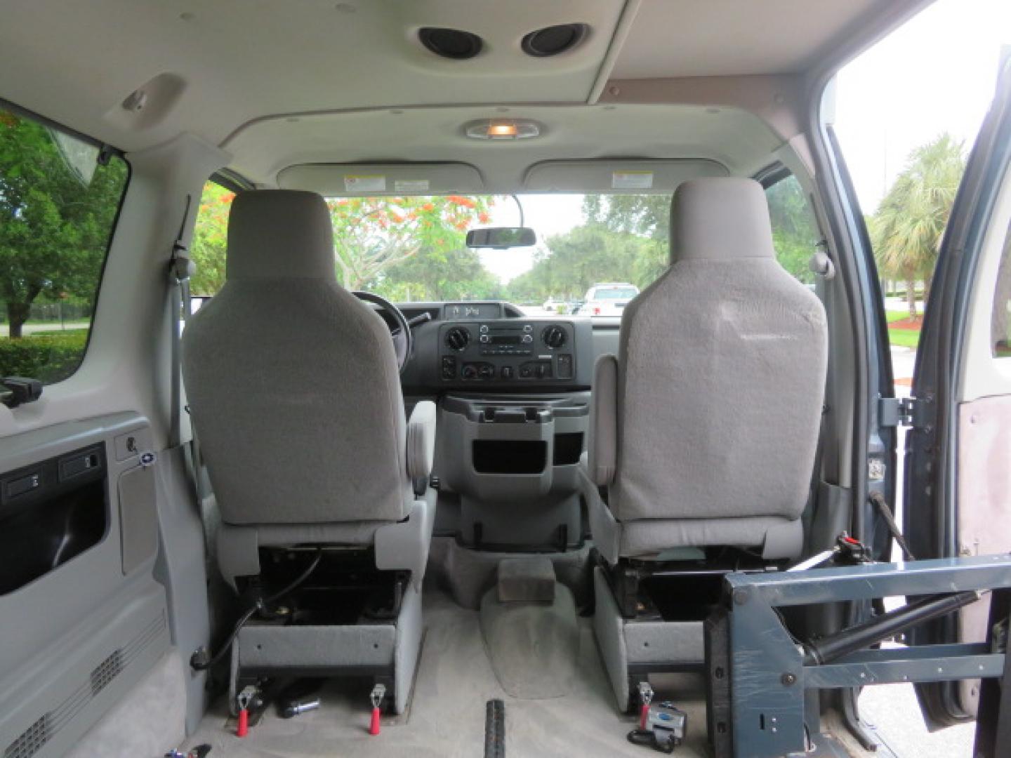 2014 Northsky Blue /Gray Ford E-Series Wagon E-150 XLT (1FMNE1BL1ED) with an 5.4L V8 SOHC 16V FFV engine, 4-Speed Automatic transmission, located at 4301 Oak Circle #19, Boca Raton, FL, 33431, (954) 561-2499, 26.388472, -80.084045 - You are looking at a Stunning 2014 Ford Econoline NorCal Max Handicap Wheelchair Conversion Van with 53K Original Miles, 9 Inch Fully Lowered Floor, Remote Control Power Side Entry Doors, Raised Side Entry Doors, Q Straint Tie Down System with Ratchet Straps, Quick Release Front Seats, VMI 600LB Sid - Photo#58