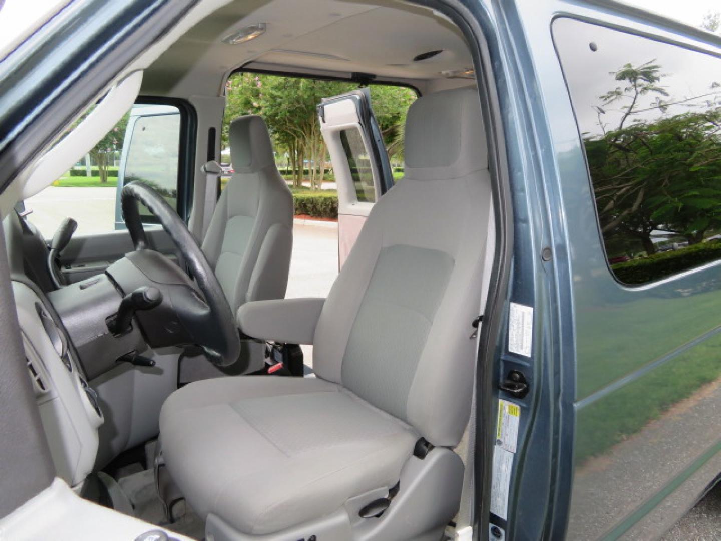 2014 Northsky Blue /Gray Ford E-Series Wagon E-150 XLT (1FMNE1BL1ED) with an 5.4L V8 SOHC 16V FFV engine, 4-Speed Automatic transmission, located at 4301 Oak Circle #19, Boca Raton, FL, 33431, (954) 561-2499, 26.388472, -80.084045 - You are looking at a Stunning 2014 Ford Econoline NorCal Max Handicap Wheelchair Conversion Van with 53K Original Miles, 9 Inch Fully Lowered Floor, Remote Control Power Side Entry Doors, Raised Side Entry Doors, Q Straint Tie Down System with Ratchet Straps, Quick Release Front Seats, VMI 600LB Sid - Photo#67