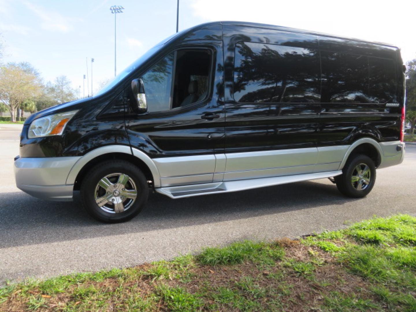 2017 Black /Gray Ford Transit 250 Van Med. Roof w/Sliding Pass. 148-in. WB (1FTYR2CGXHK) with an 3.5L V6 DOHC 24V engine, 6A transmission, located at 4301 Oak Circle #19, Boca Raton, FL, 33431, (954) 561-2499, 26.388472, -80.084045 - You are looking at a Gorgeous 2017 Ford Transit T250 Medium Roof Sherrod Handicap Wheelchair Conversion Van Fully Loaded With 32K Original Miles, Rear Entry Braunability Power Foldout Wheelchair Lift, Q Lock QLK150 Docking System for the wheelchair, Beautiful Gray Leather Interior, Rear Entertainmen - Photo#12