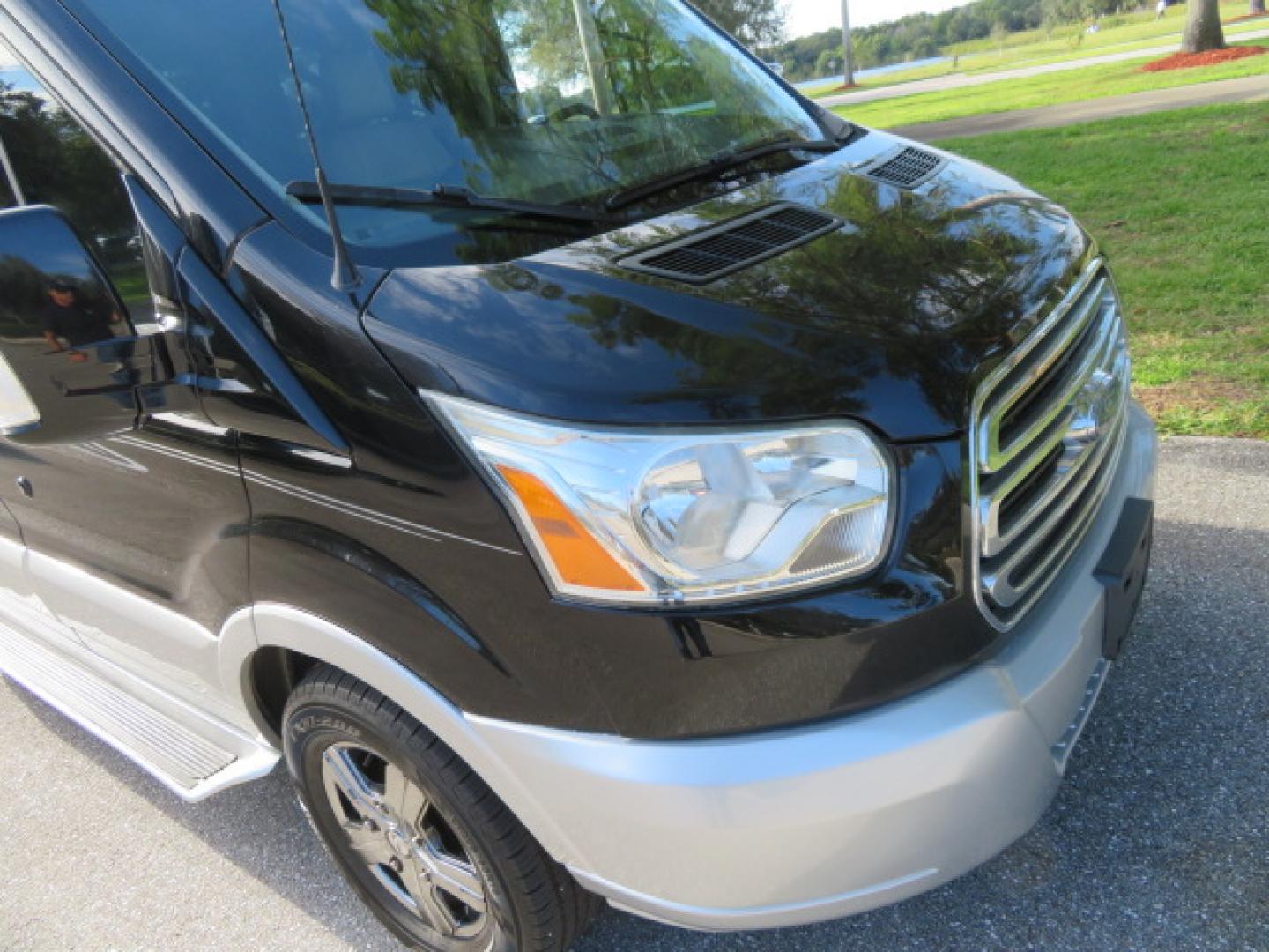 2017 Black /Gray Ford Transit 250 Van Med. Roof w/Sliding Pass. 148-in. WB (1FTYR2CGXHK) with an 3.5L V6 DOHC 24V engine, 6A transmission, located at 4301 Oak Circle #19, Boca Raton, FL, 33431, (954) 561-2499, 26.388472, -80.084045 - You are looking at a Gorgeous 2017 Ford Transit T250 Medium Roof Sherrod Handicap Wheelchair Conversion Van Fully Loaded With 32K Original Miles, Rear Entry Braunability Power Foldout Wheelchair Lift, Q Lock QLK150 Docking System for the wheelchair, Beautiful Gray Leather Interior, Rear Entertainmen - Photo#27