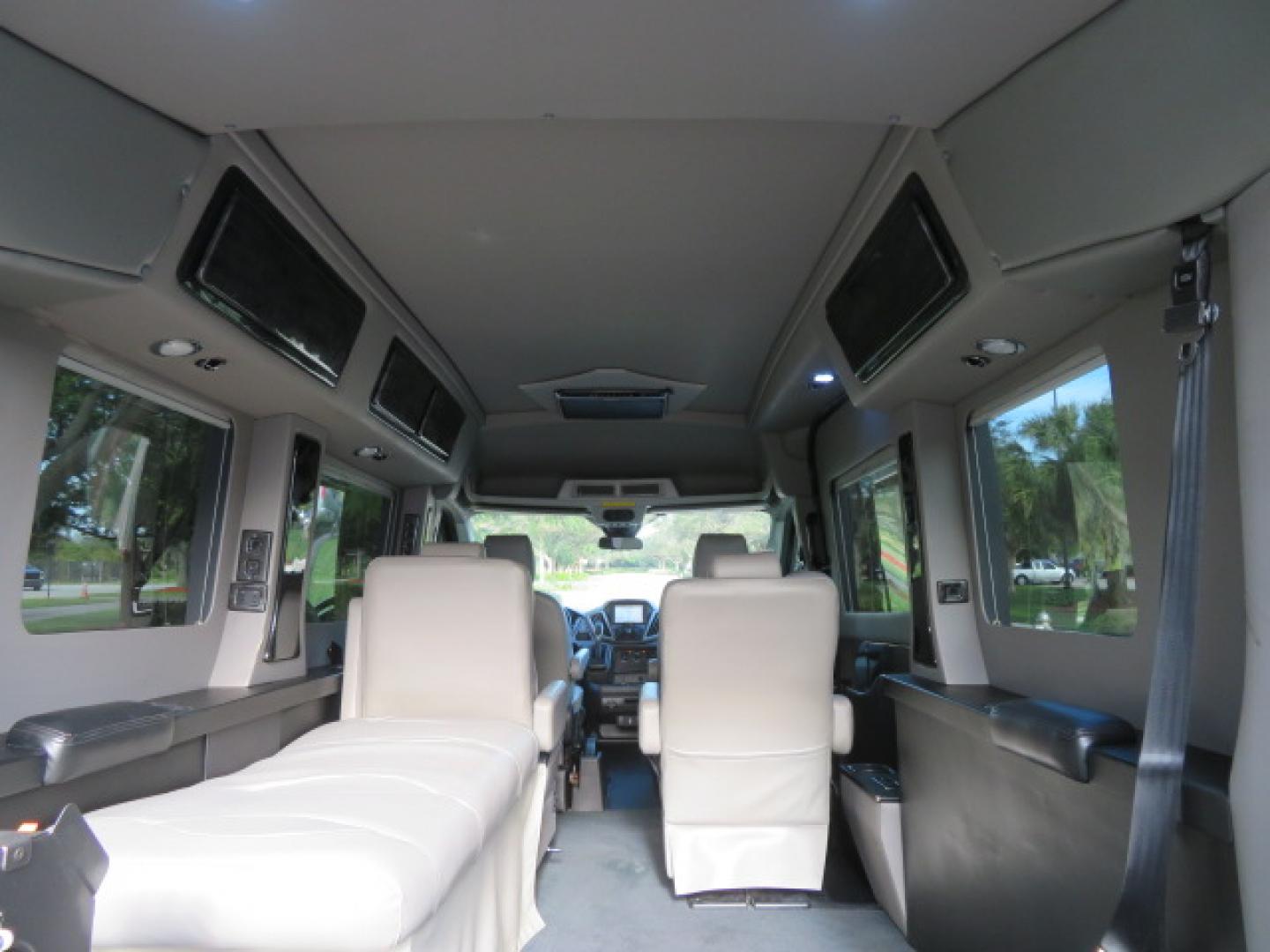 2017 Black /Gray Ford Transit 250 Van Med. Roof w/Sliding Pass. 148-in. WB (1FTYR2CGXHK) with an 3.5L V6 DOHC 24V engine, 6A transmission, located at 4301 Oak Circle #19, Boca Raton, FL, 33431, (954) 561-2499, 26.388472, -80.084045 - You are looking at a Gorgeous 2017 Ford Transit T250 Medium Roof Sherrod Handicap Wheelchair Conversion Van Fully Loaded With 32K Original Miles, Rear Entry Braunability Power Foldout Wheelchair Lift, Q Lock QLK150 Docking System for the wheelchair, Beautiful Gray Leather Interior, Rear Entertainmen - Photo#45